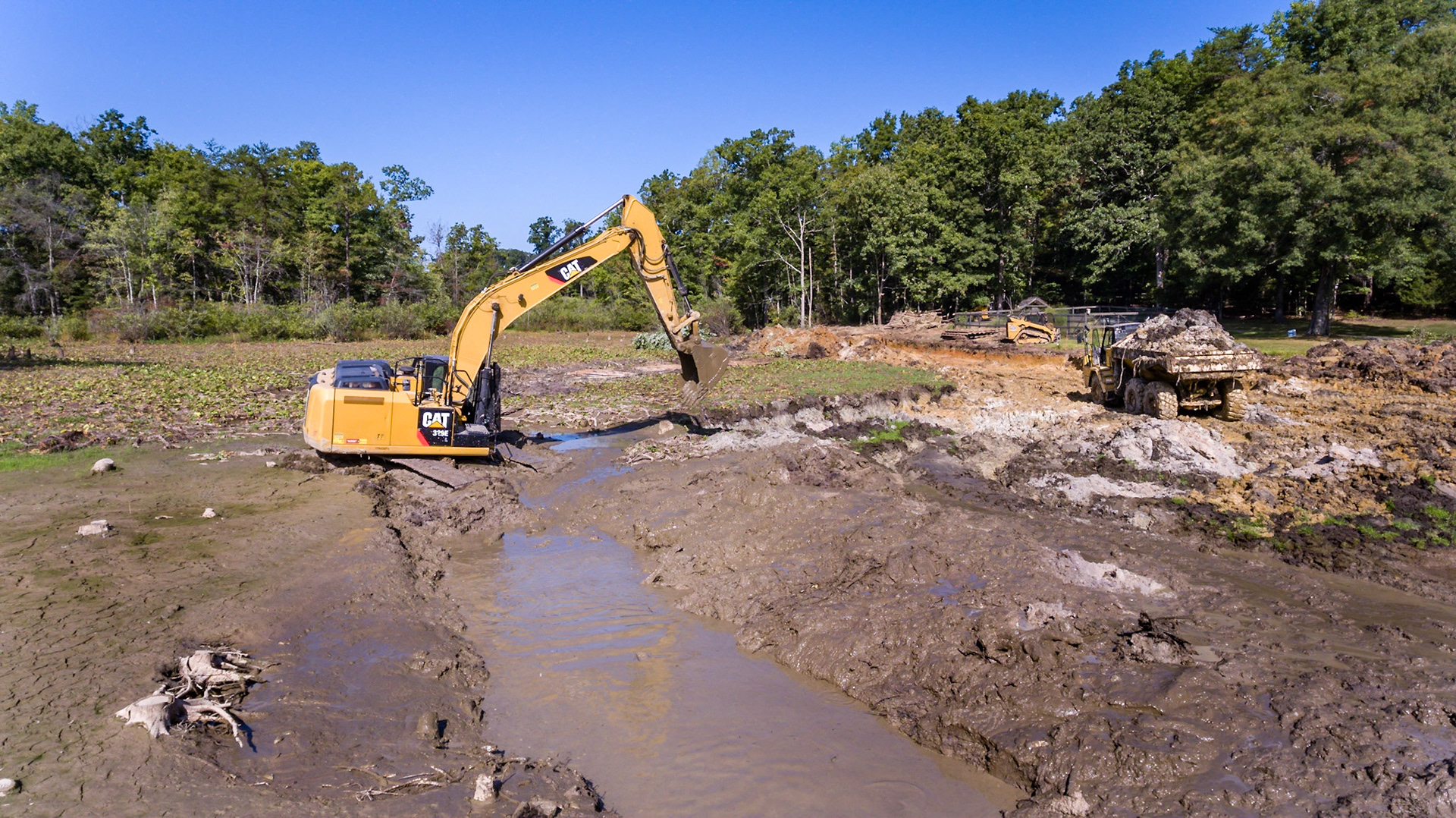 Digging out my pond that lily pads of taken over