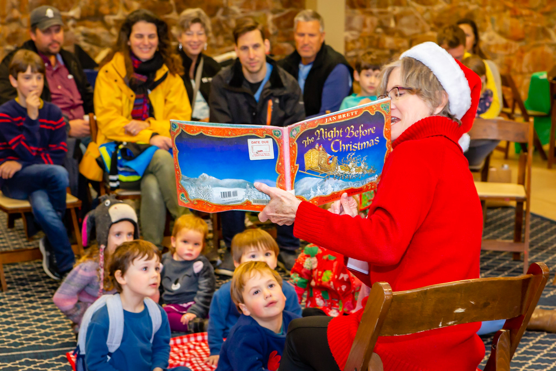 The reading of The Night Before Christmas is enjoyed by all ages.