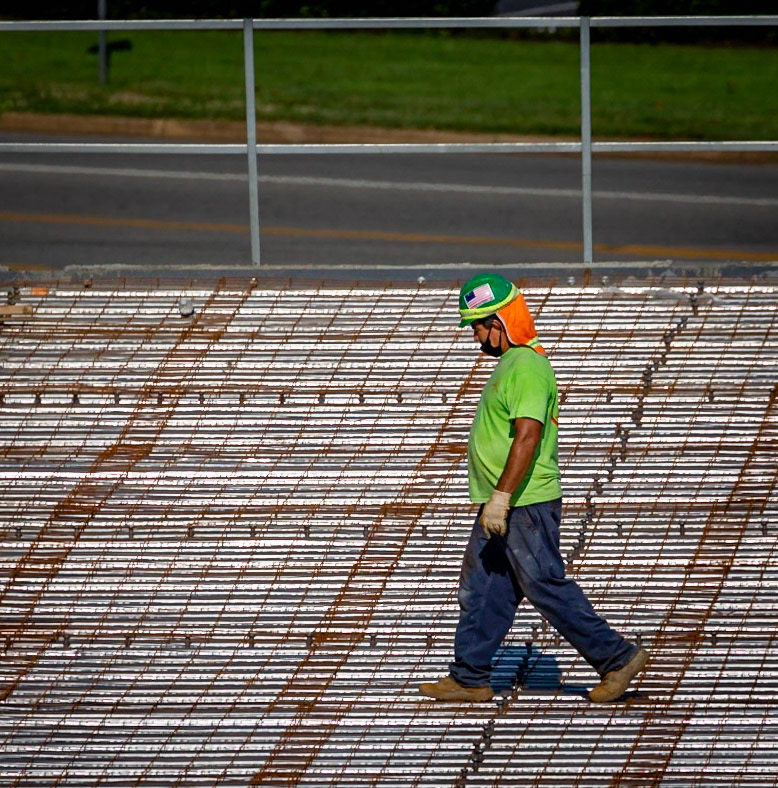 6/26/2020 photo of construction work on Storage Sense facility.  Concreste wire mesh and rebar being installed in preperation to pour second floor.