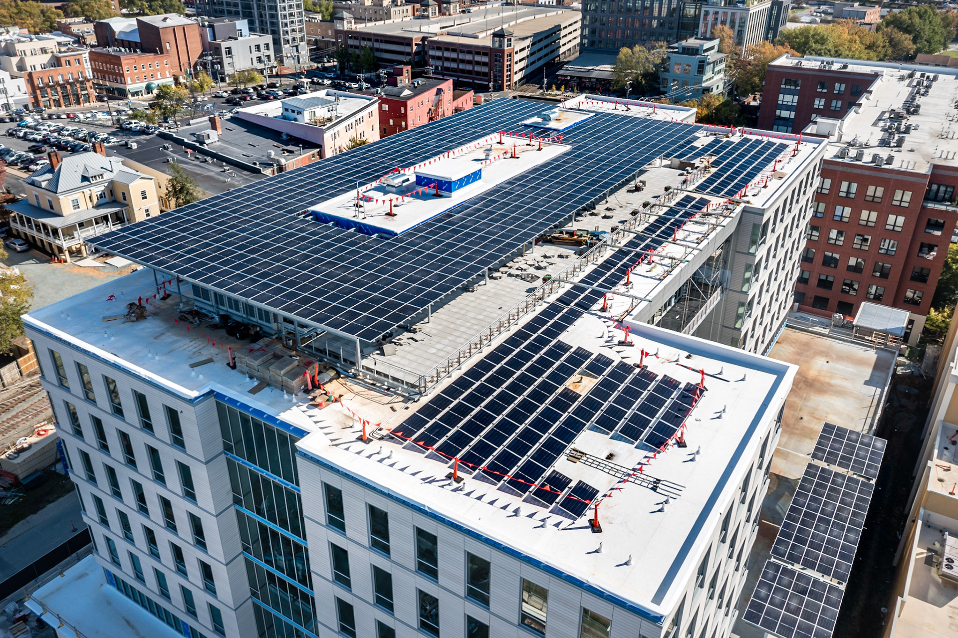 Roof top view of the Apex Clean Energy timber frame building with solar panels installed.