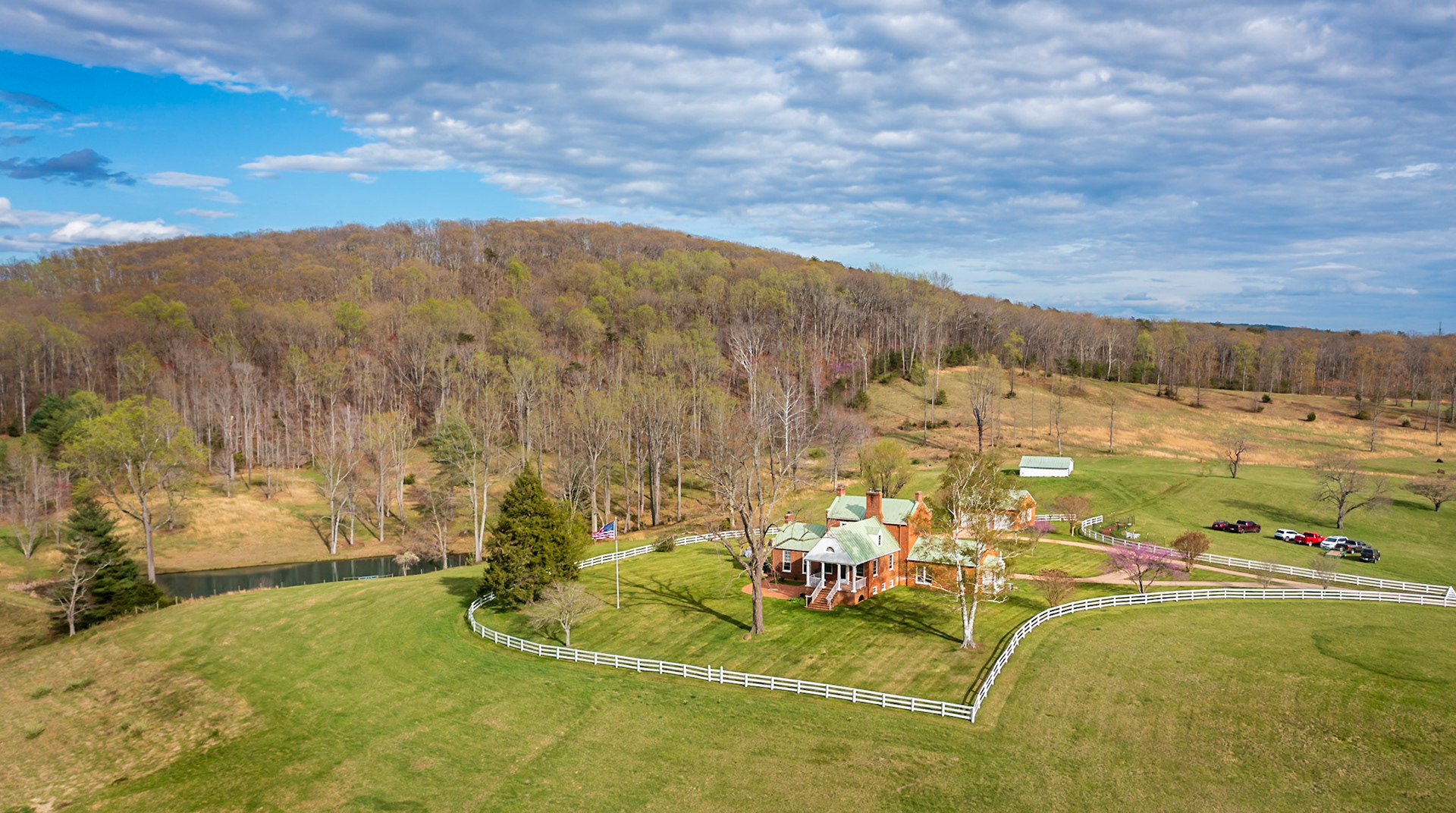 Aerial, white fence, house, mountain