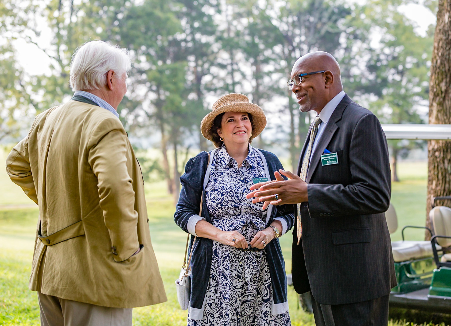Three people having a discussion