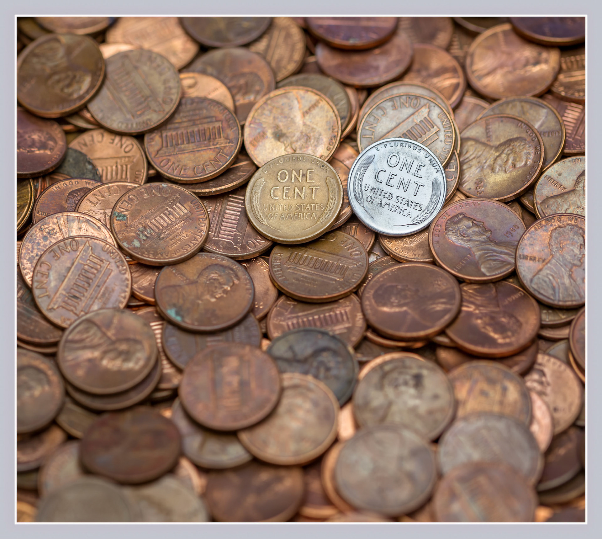 Steel penny among the copper pennies