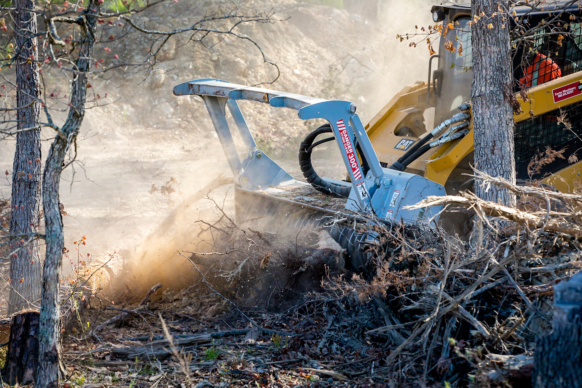 A forest mulcher at work