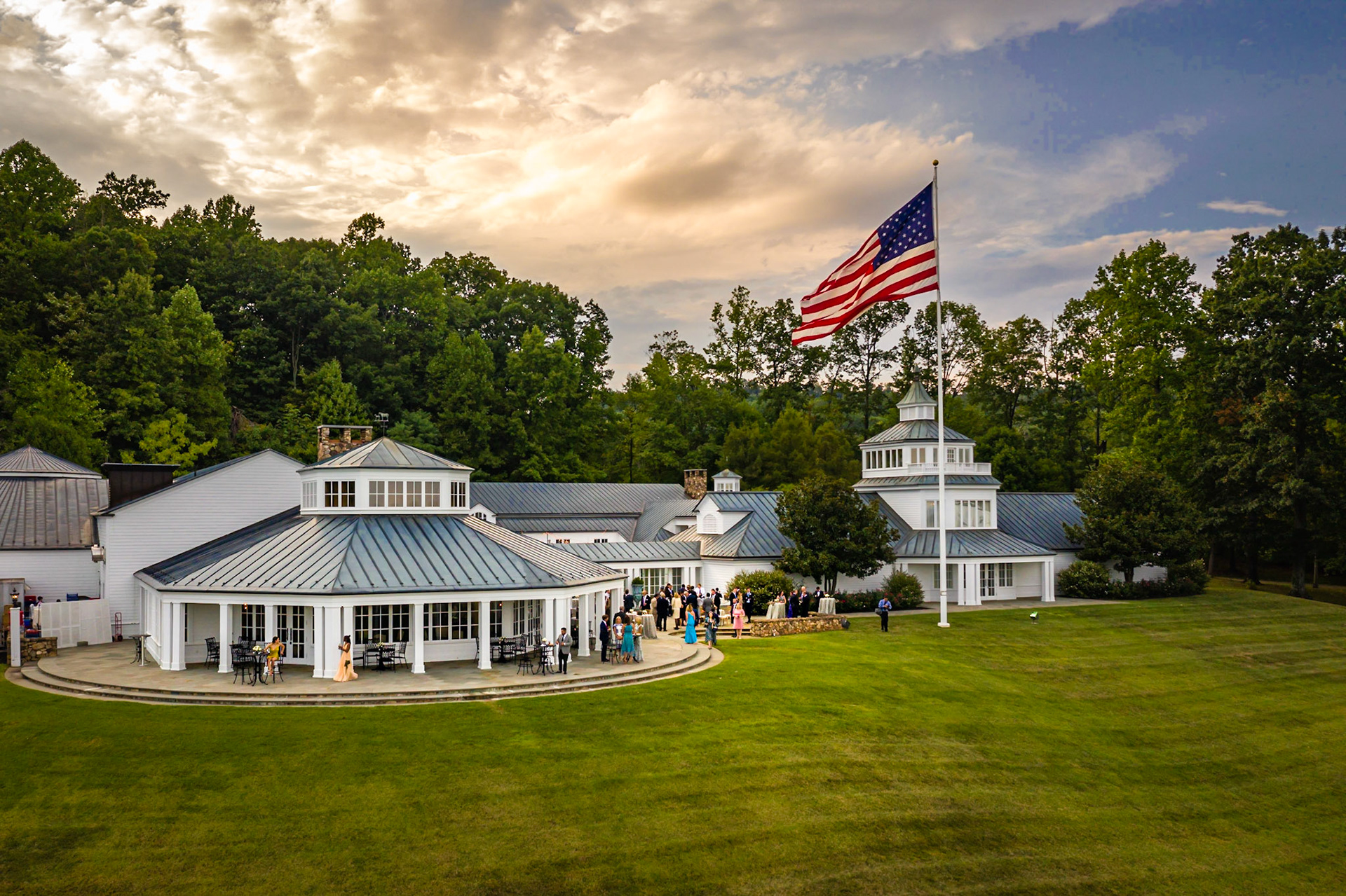 American flag flying over a wedding reception