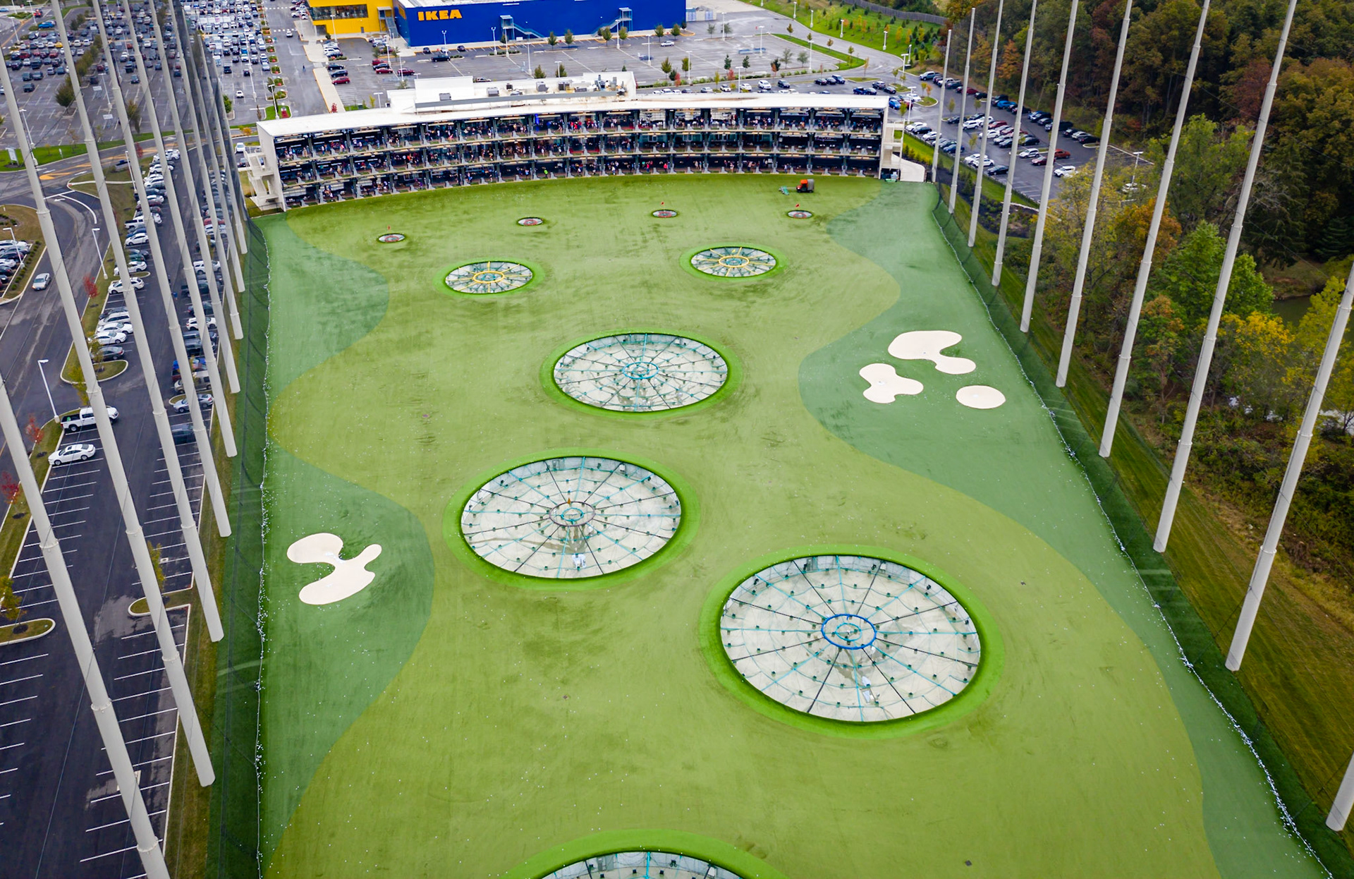 Three decks, 102 of people hitting golfballs at the Topgolf driving range. #topgolf #golf #drivingrange #Columbus #aerial
