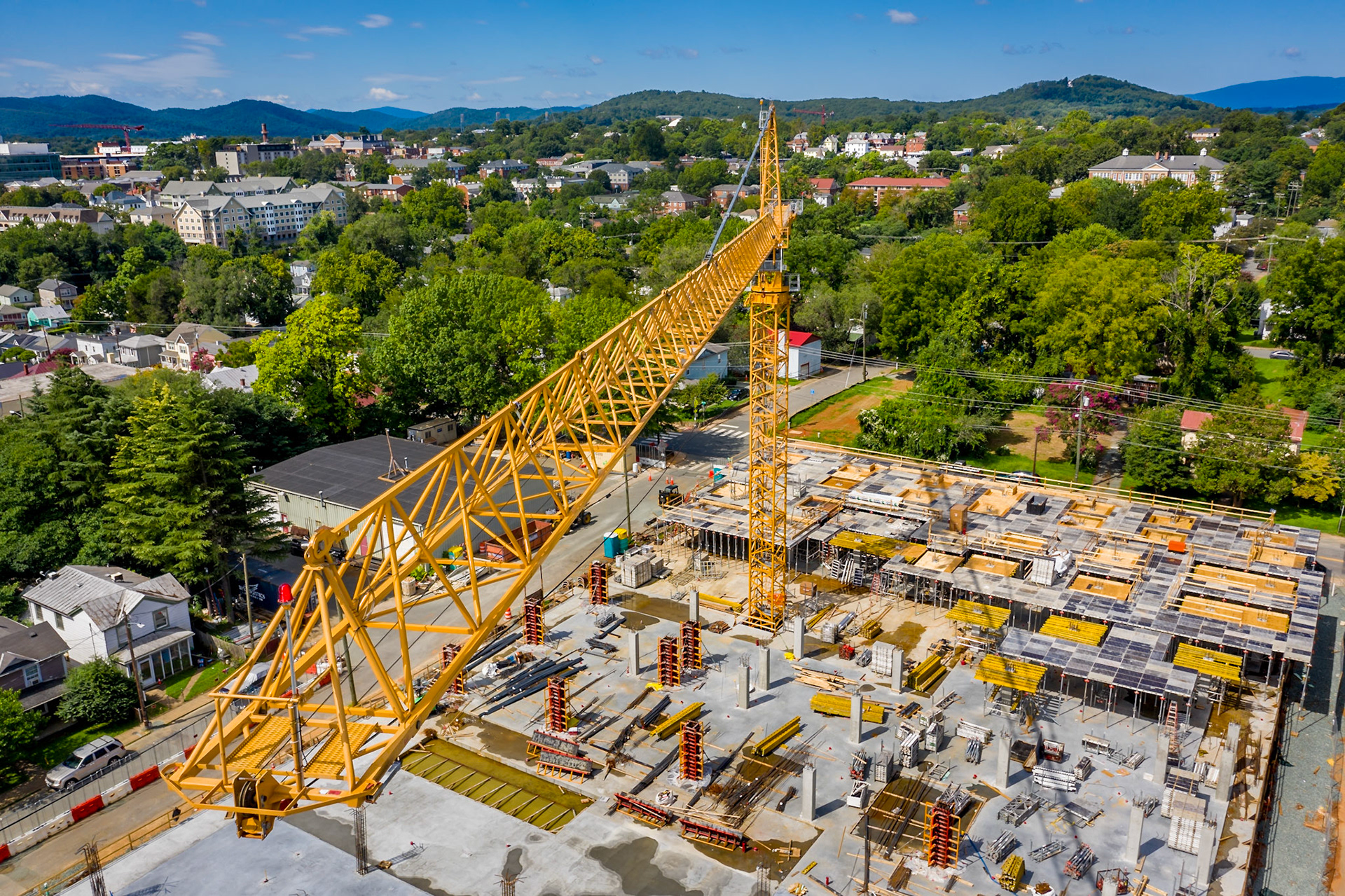 Towering crane at the 10th &amp; Dairy Market Apartments construction site