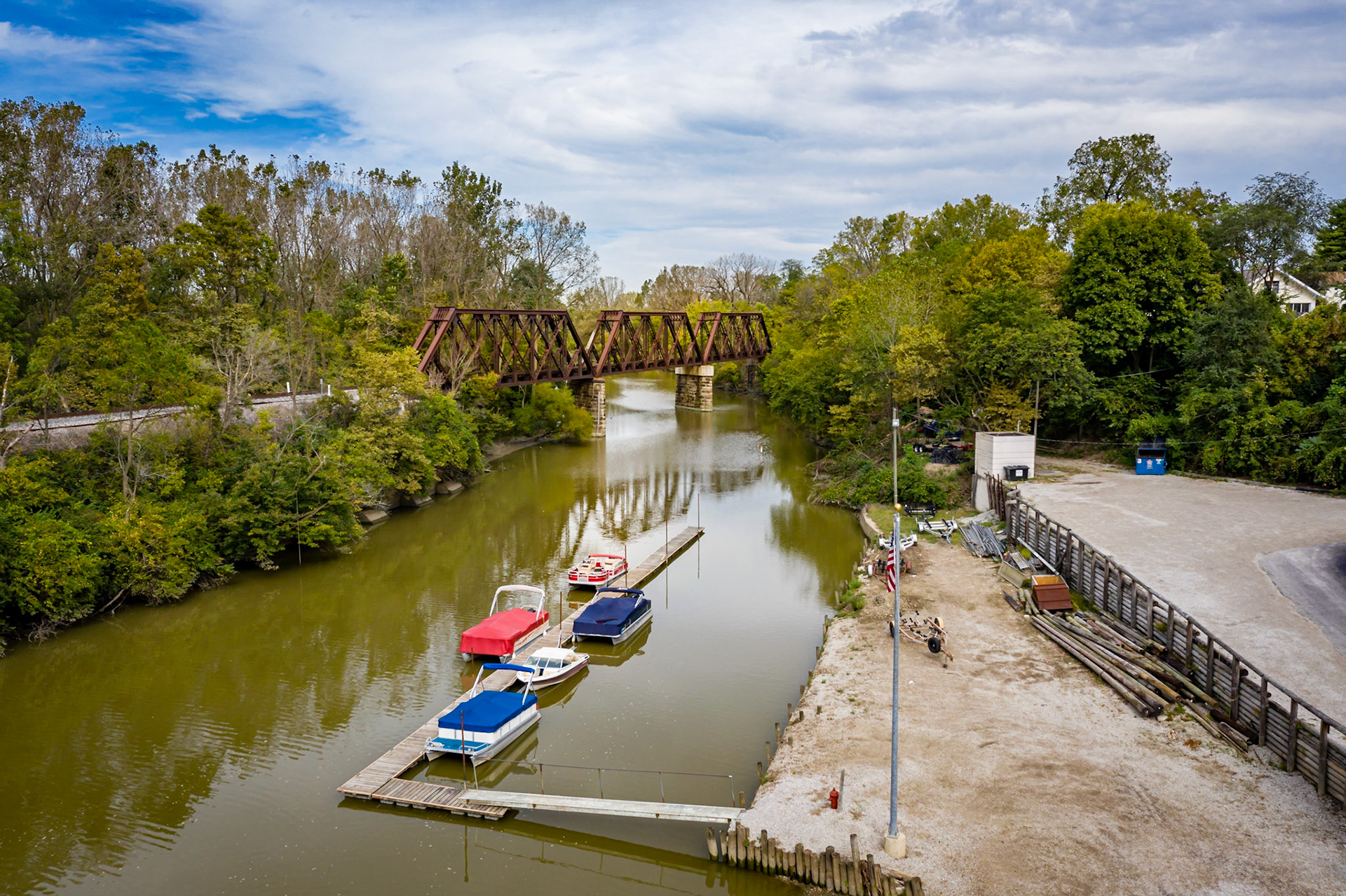 Along the Sandusky River in Fremont, OH. Boats and railroad bridge