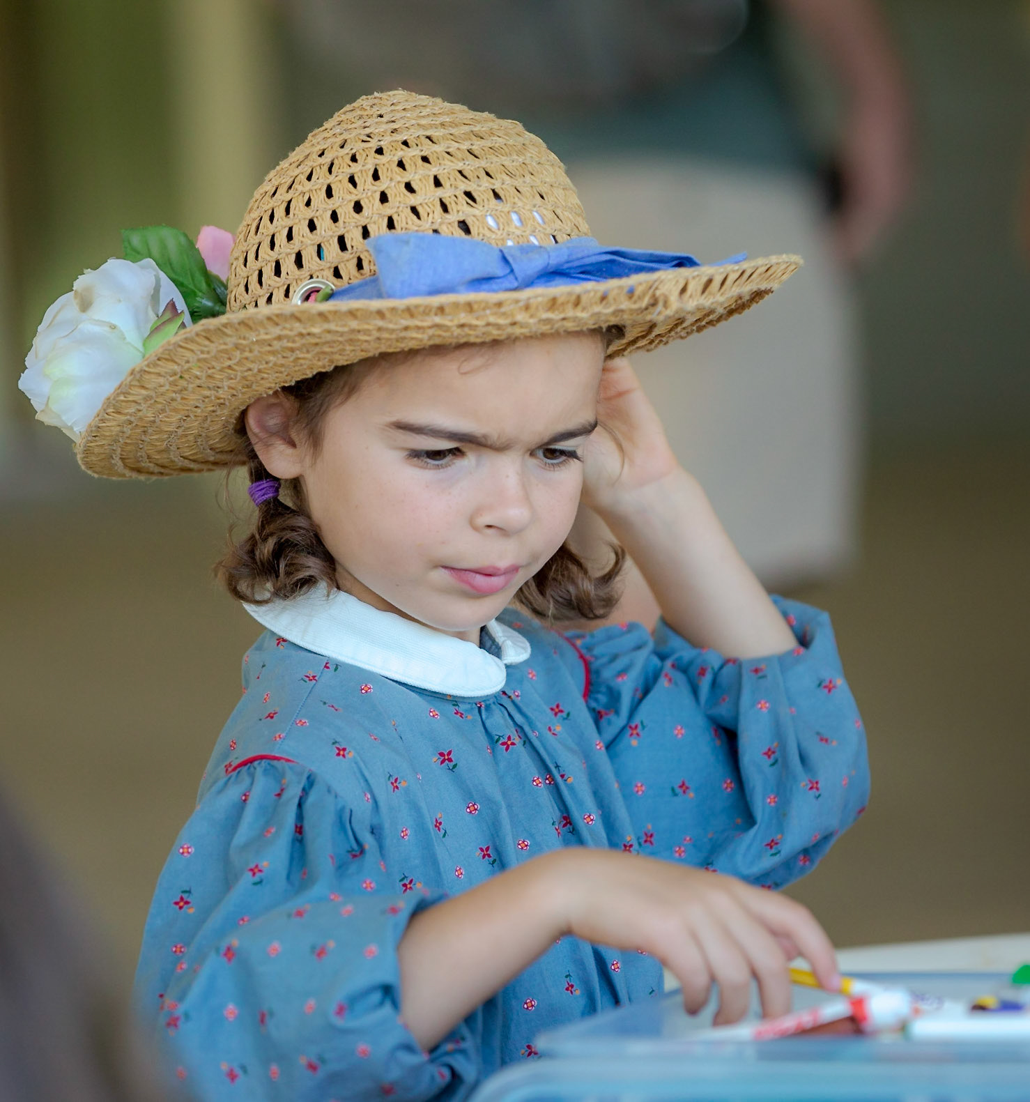 Young girl wearing a hat