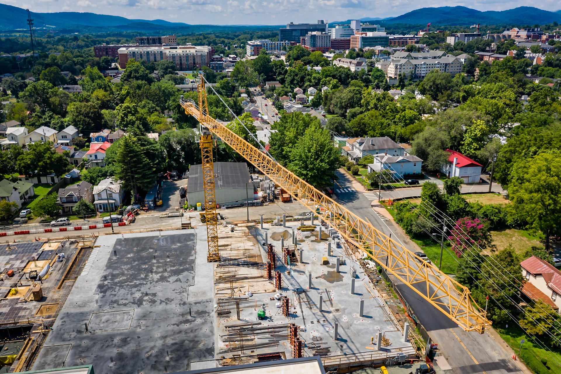 Towering crane at the 10th &amp; Dairy Market Apartments construction site