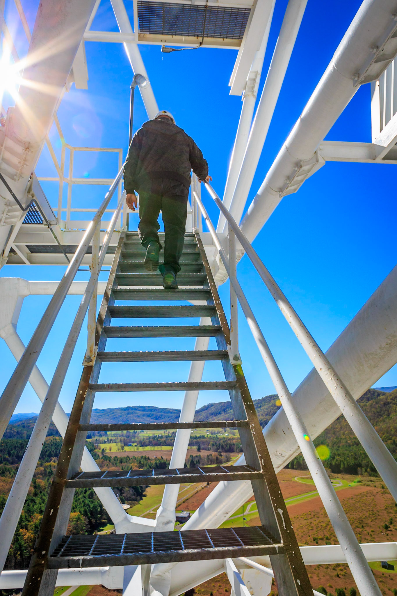 The Green Bank Ovservatory celebrates 60 years of science. Going up stairs with a sunburst