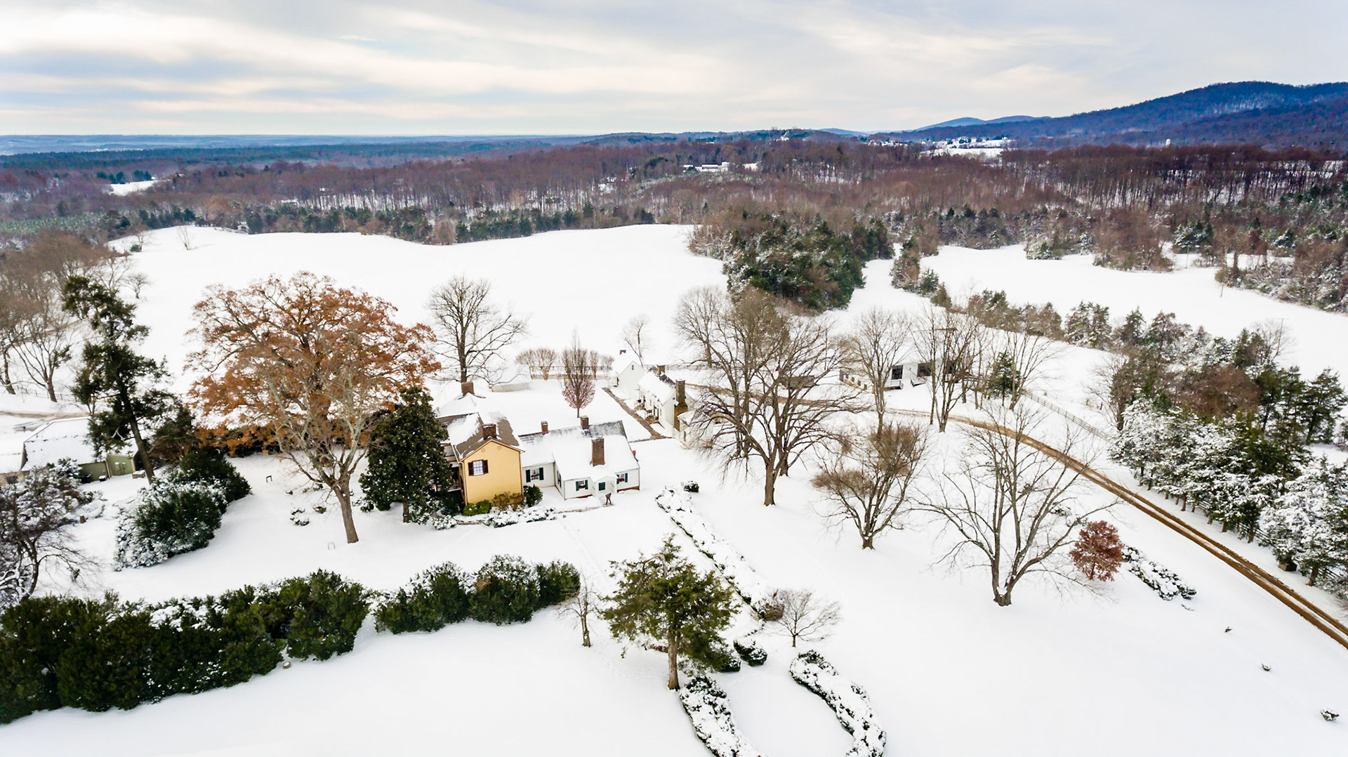 Aerial view, snow fall at James Monroe Highland