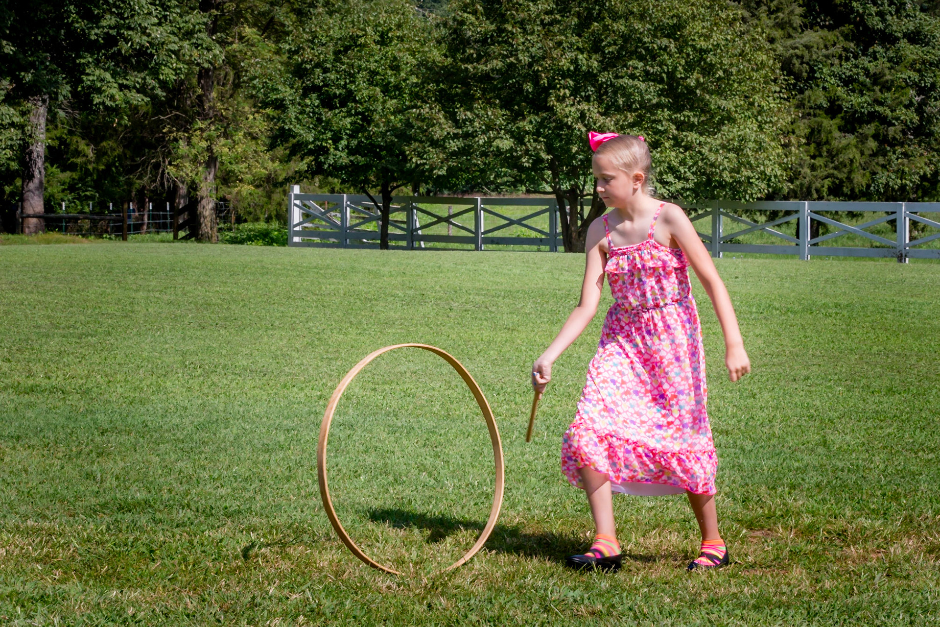 Young girl playing with toys from the past