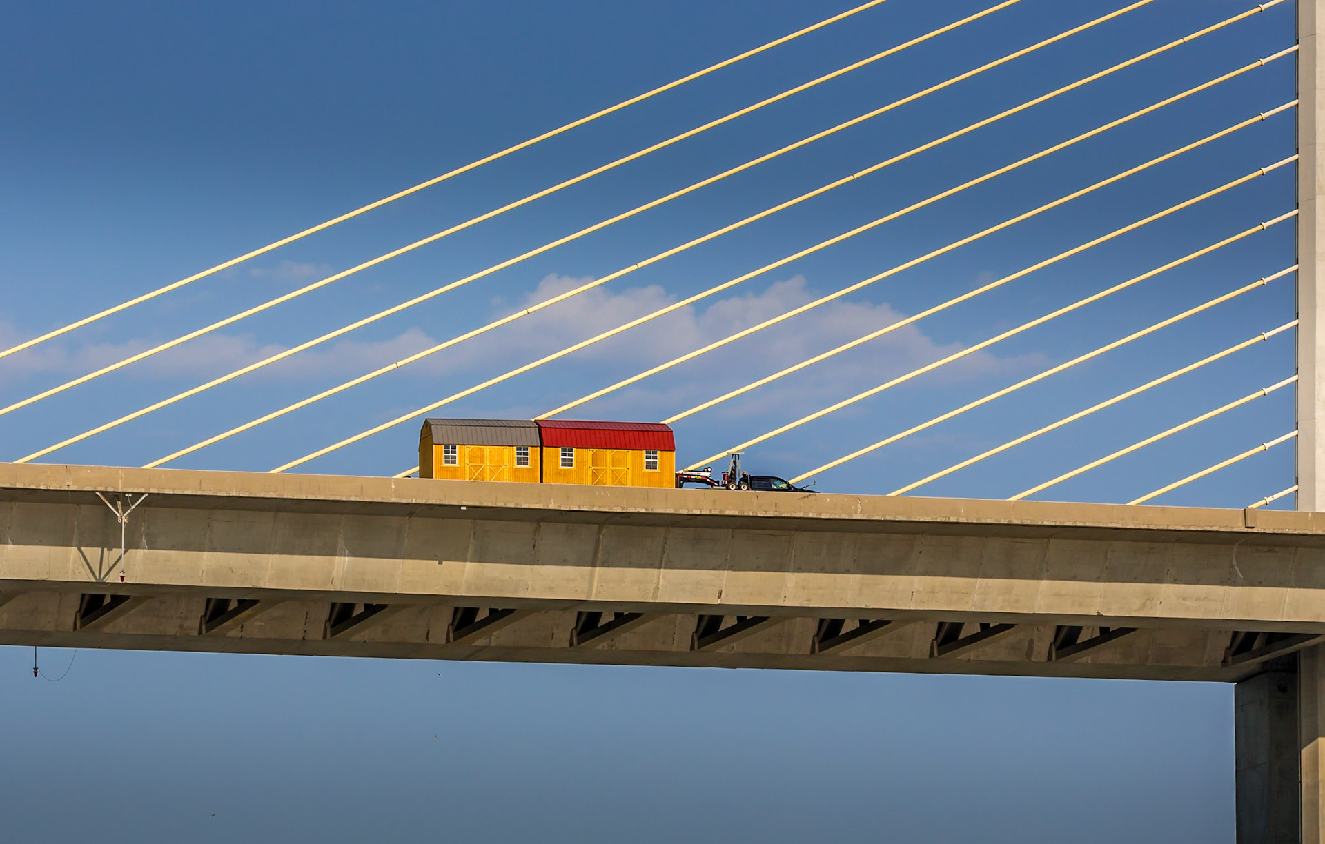 Storage buildings crossing bridge