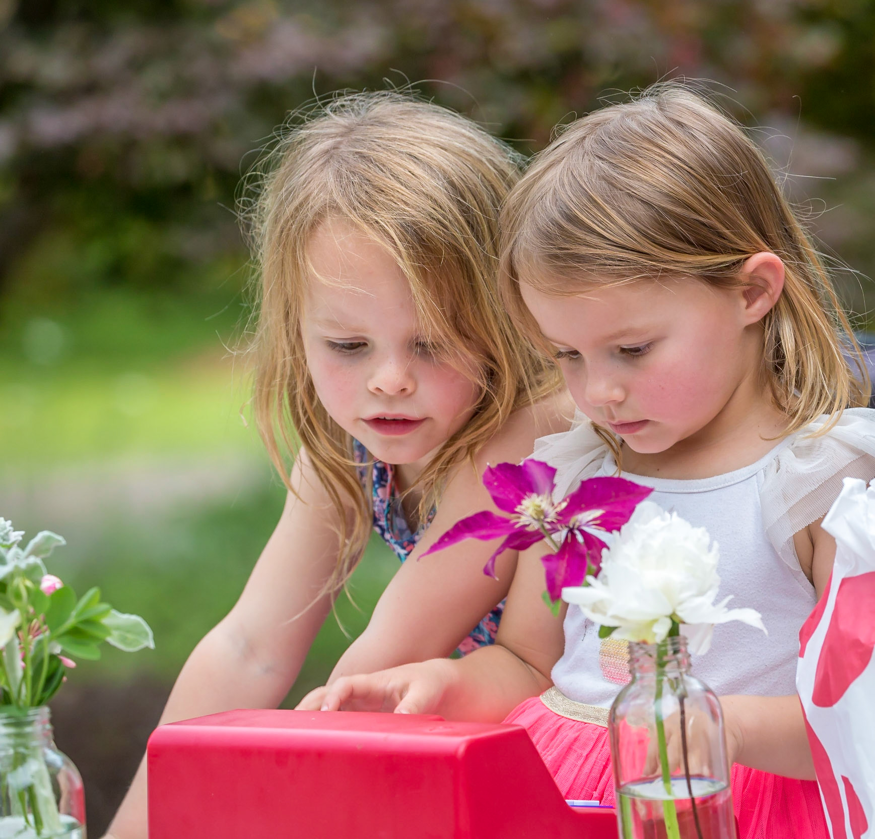 Granddaughters tending the cash register