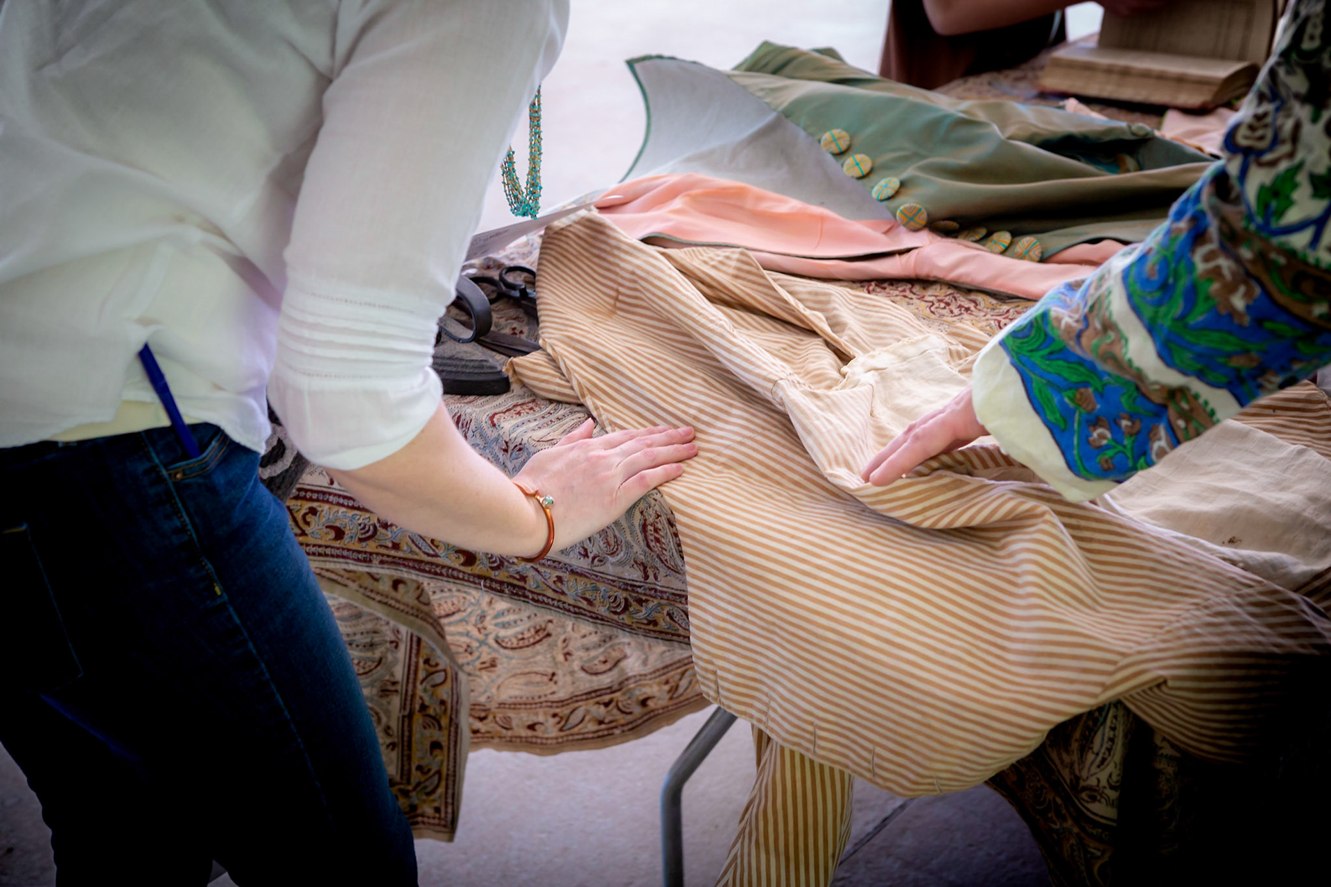 Checking out clothes that were used in the time of James Monroe