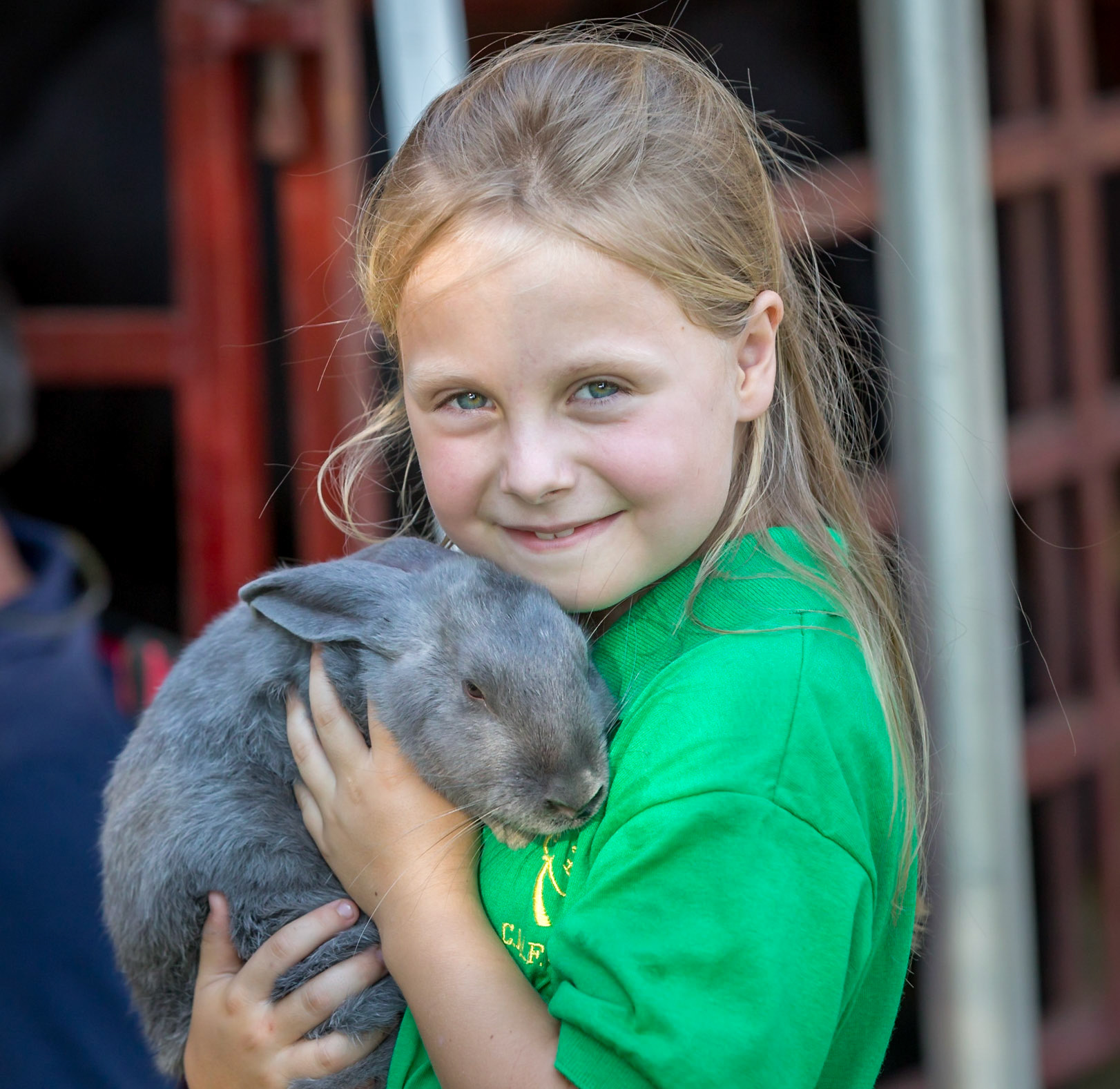 Fair at James Monroe Highlands, a girl with her rabbit