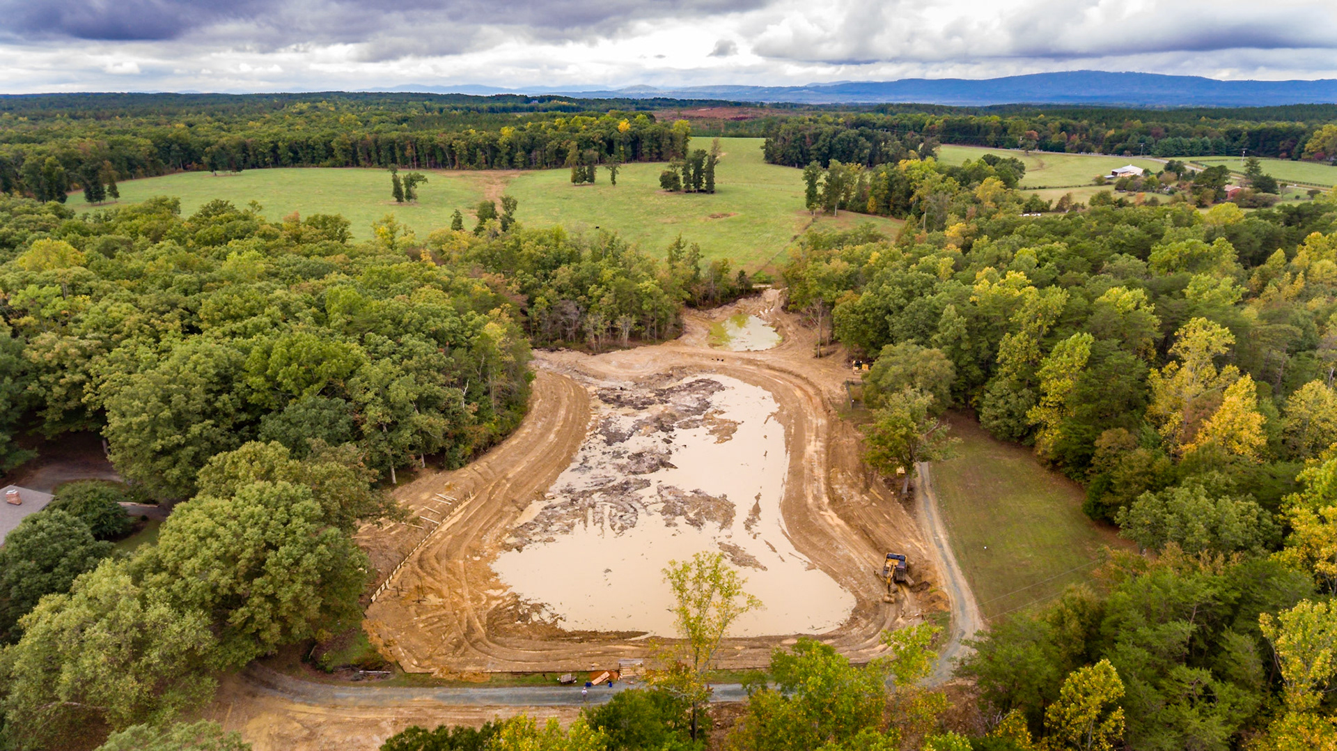 Dividing the pond will give us better assess around the property.