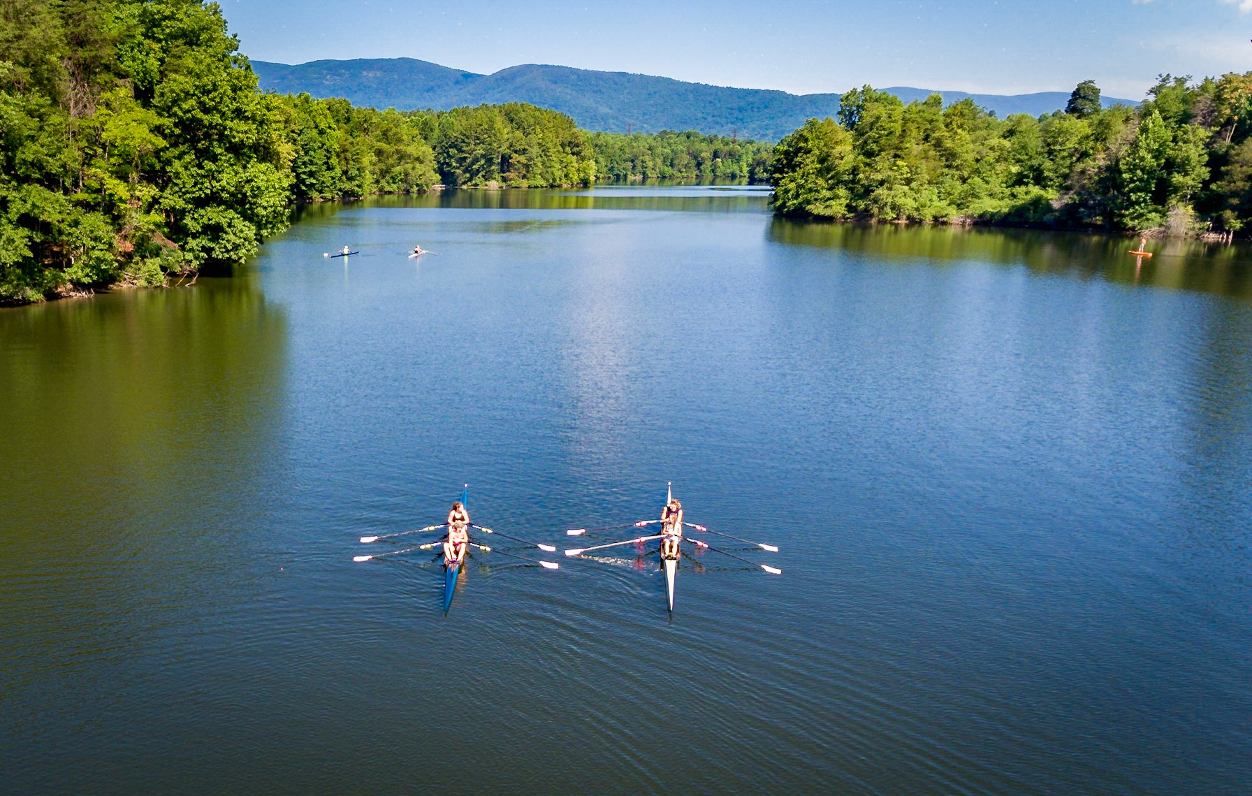 Scullers enjoying a beautiful day on the reservoir