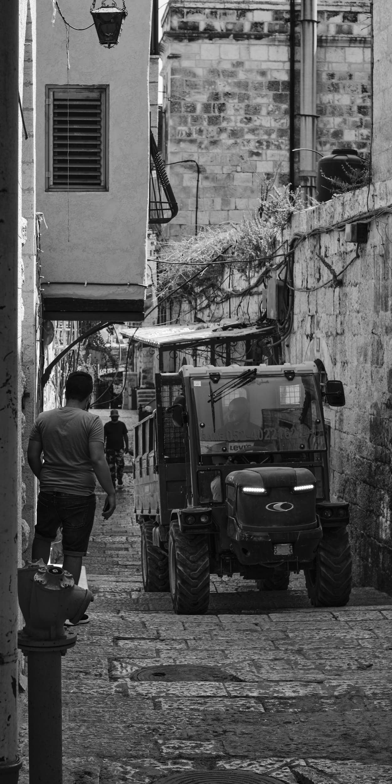 The street being blocked by morning traffic in the Christian Quarter in the Old City of Jerusalem.