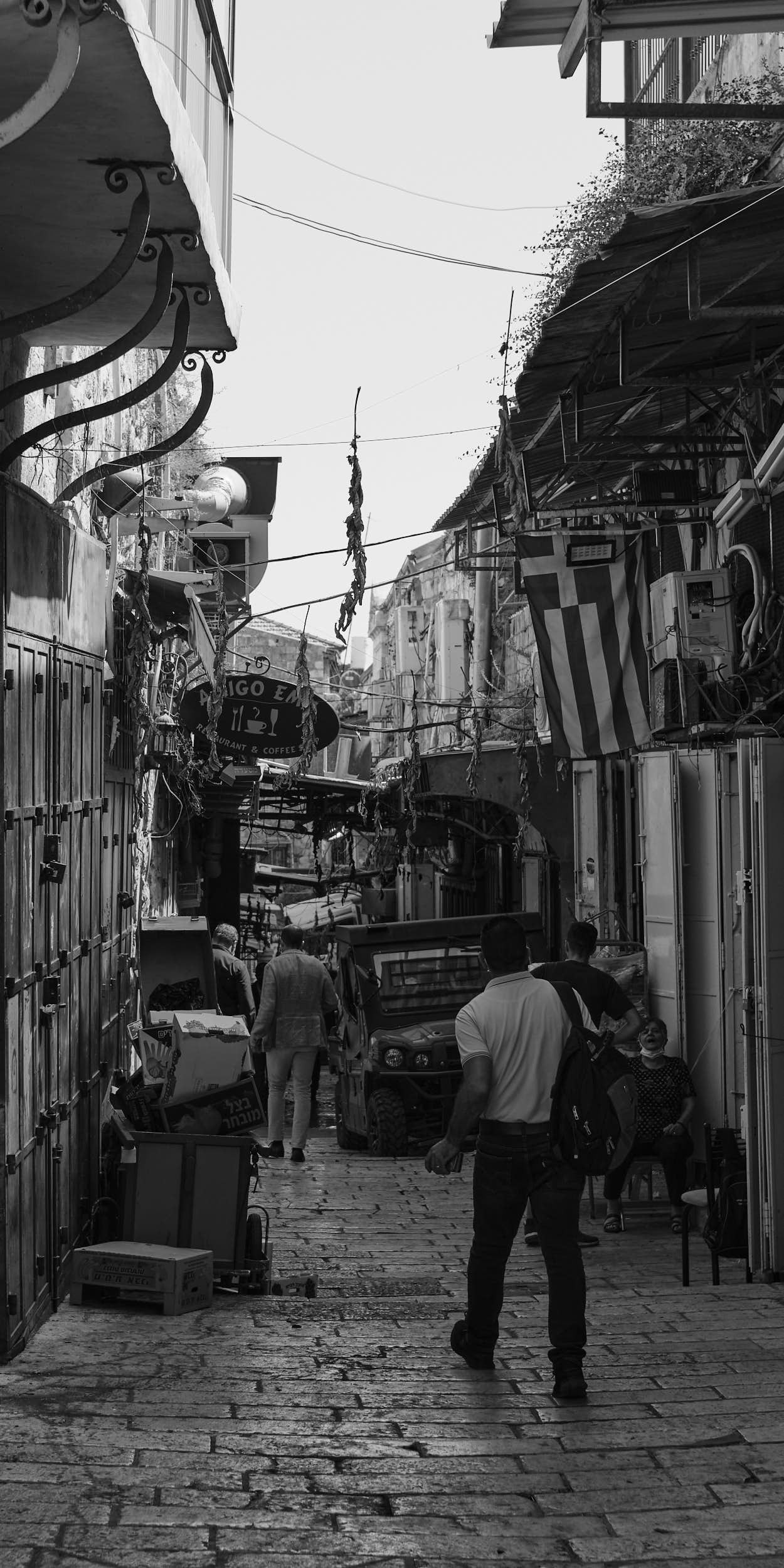 A Greek flag is seen in the shopping street in the Christian Quarter of the Old City of Jerusalem.