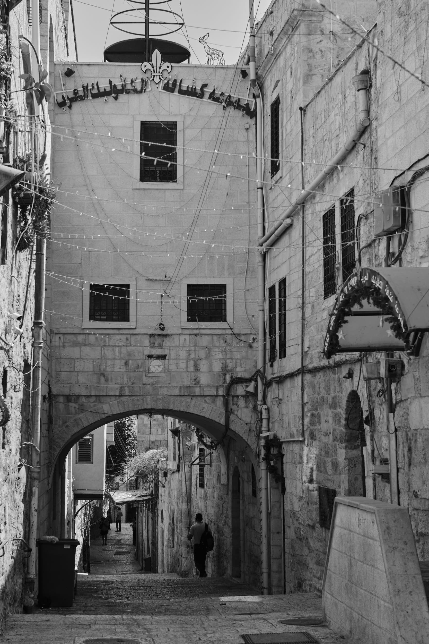 Moving nearer to the Muslim Quarter via the Sant Francis Street in the Christian Quarter of the Old City of Jerusalem.