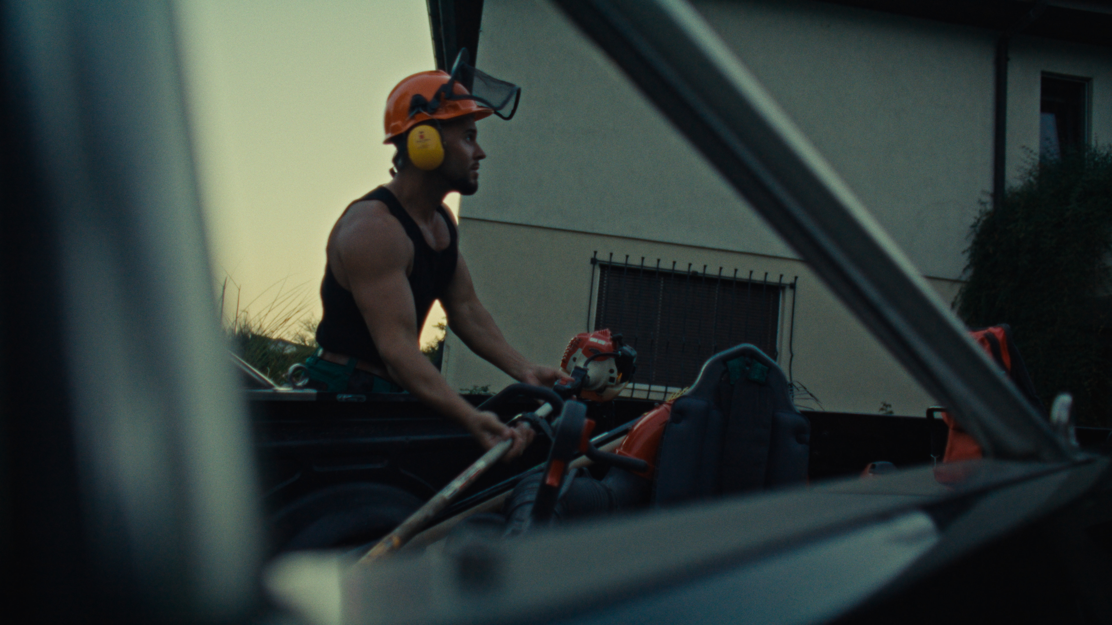 jacob muller jacobmullertv gardener arriving in the villa to start its working day he is taking the lawnmoer out of the bed of the truck