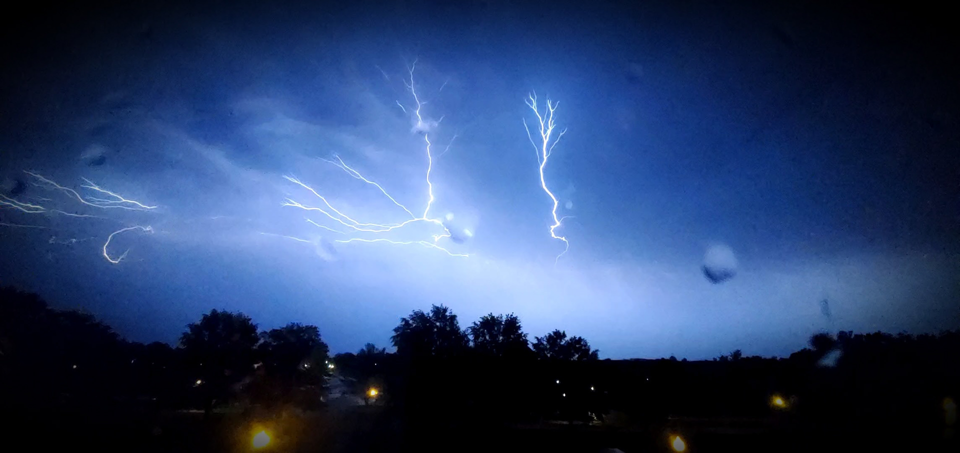 #18 Lightening Storm, 2021 Photo captures a thunderstorm as lightening strikes over Fort Meade, MD. Demos exposure and shutter techniques.