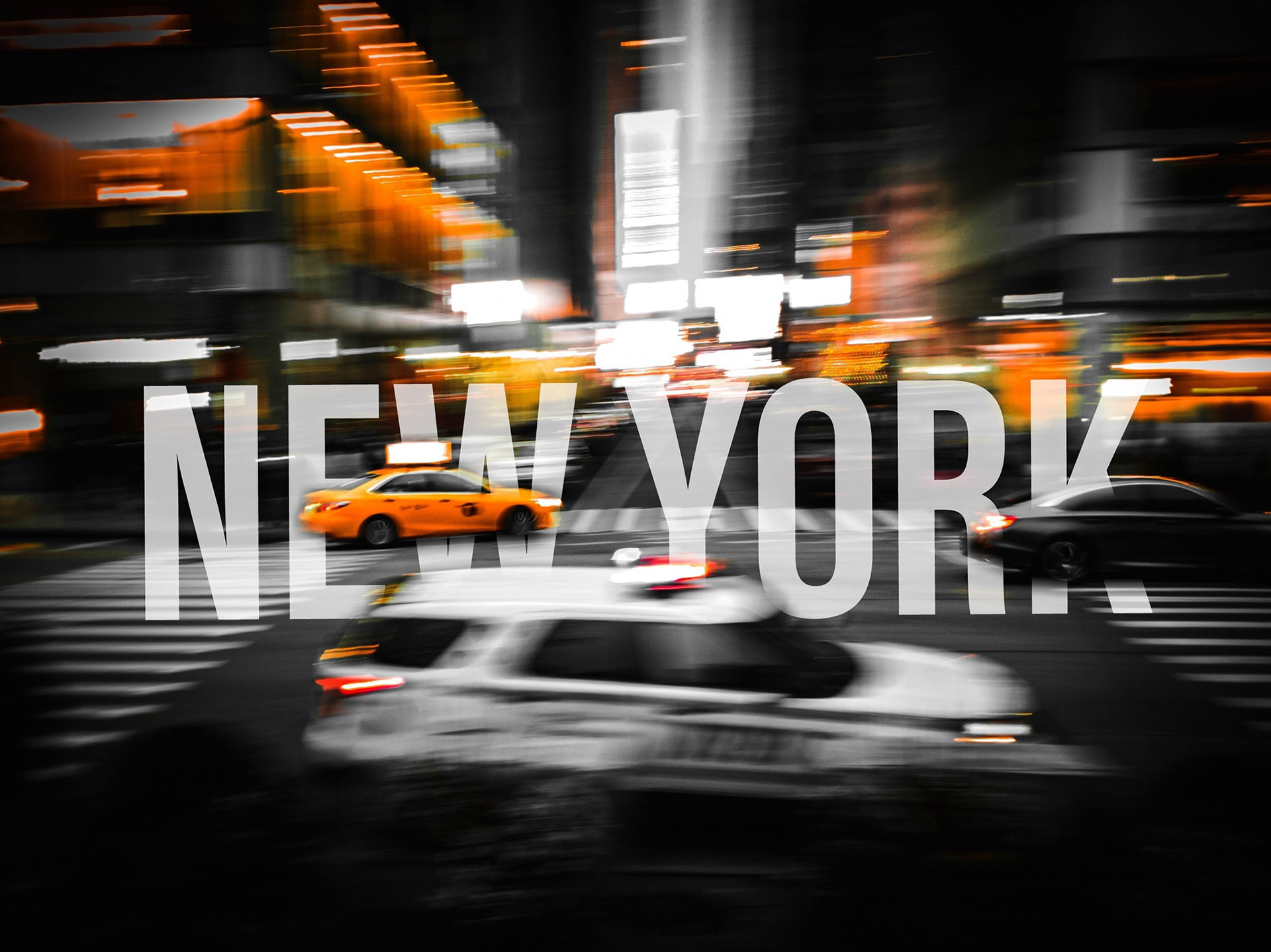 #2 New York, Dec 2021, Photo captures motion of taxis in NY with text masked out.
