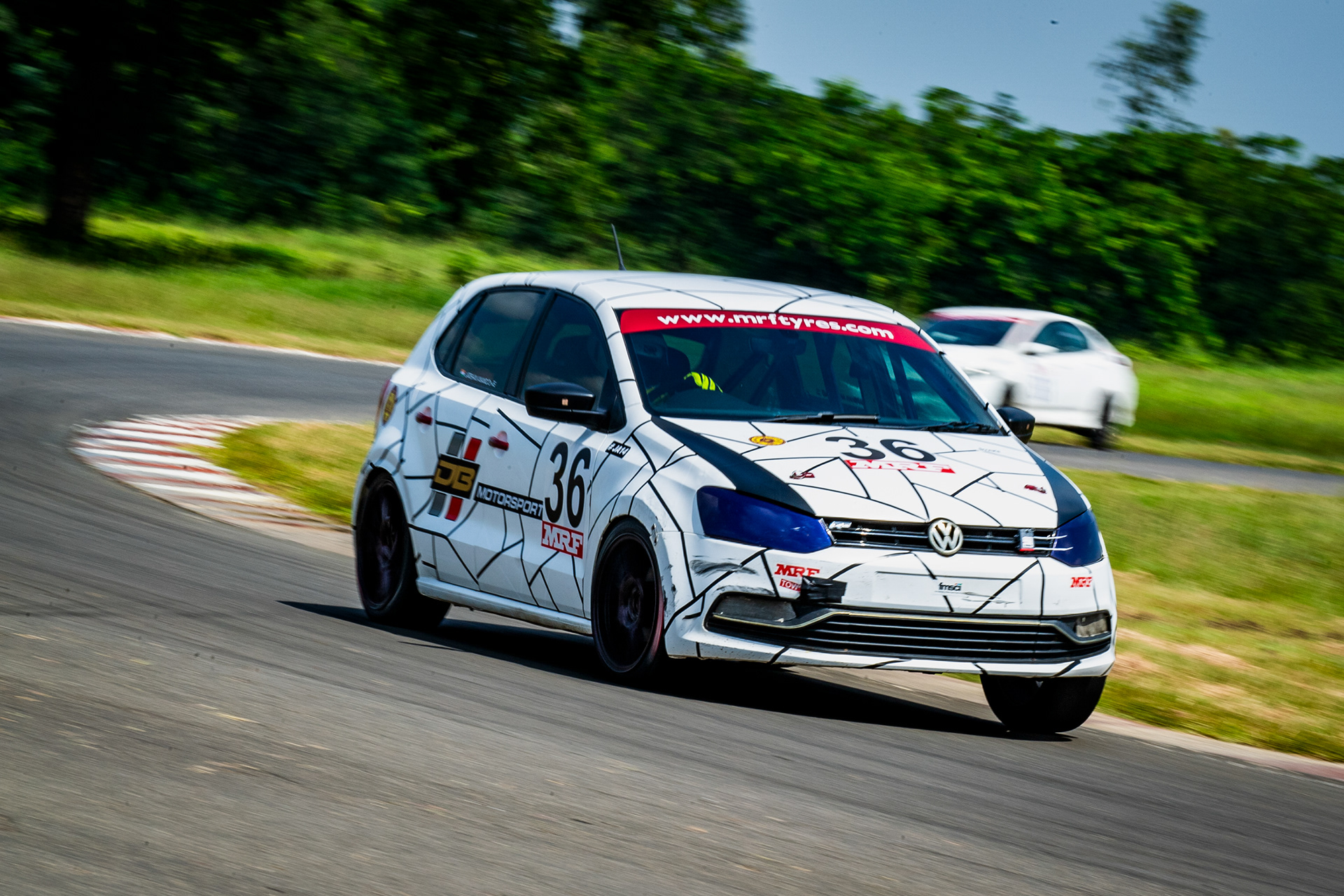 Jarshan speeding through infamous fast left hander at MIC.