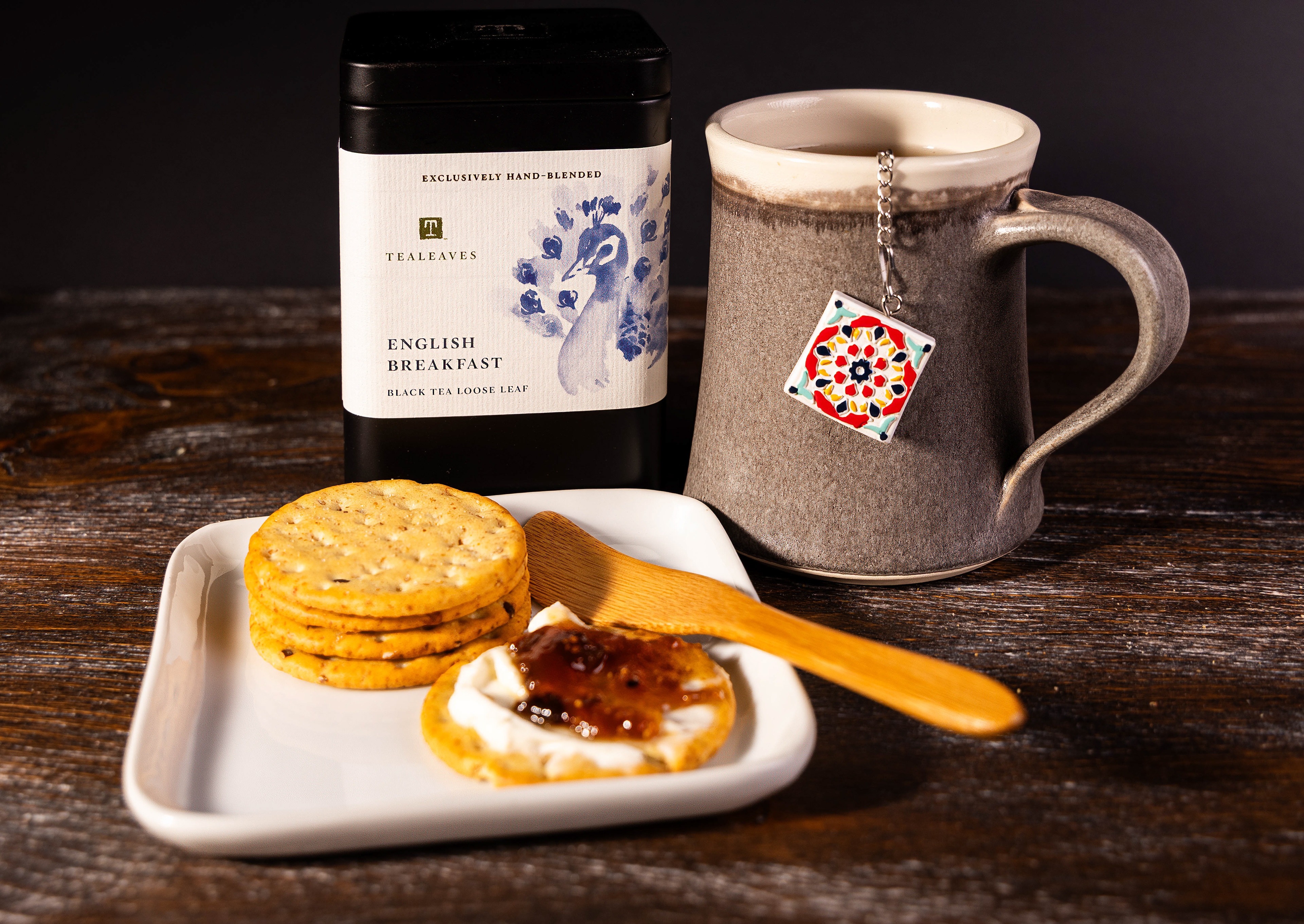 Tea with artisan mug and snack styled product photograph