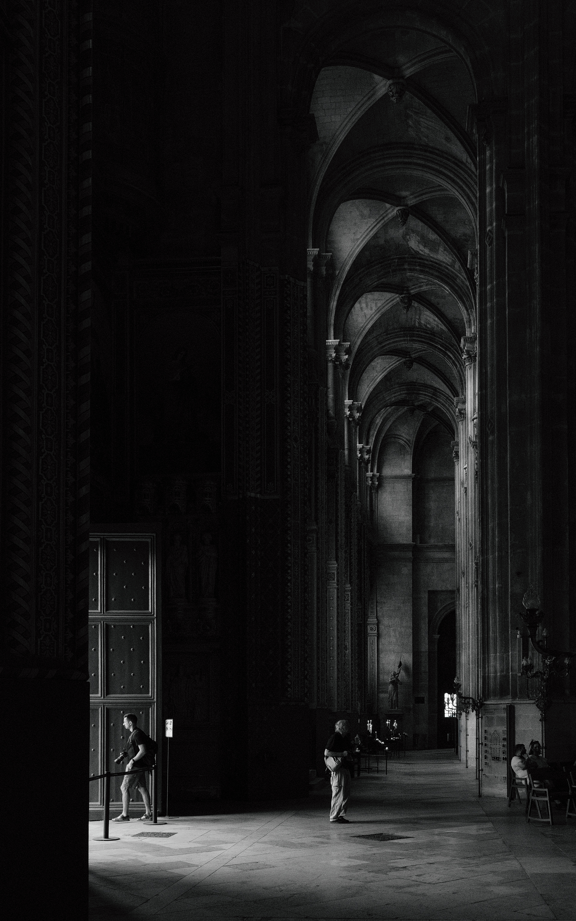 A solitary presence inside Saint-Eustache. Featured by Monomoods.