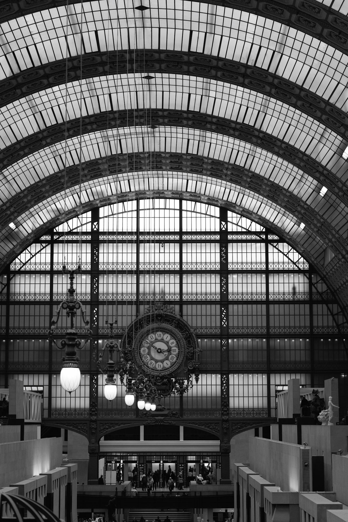 The monumental clock beneath the glass roof of the Musée d'Orsay