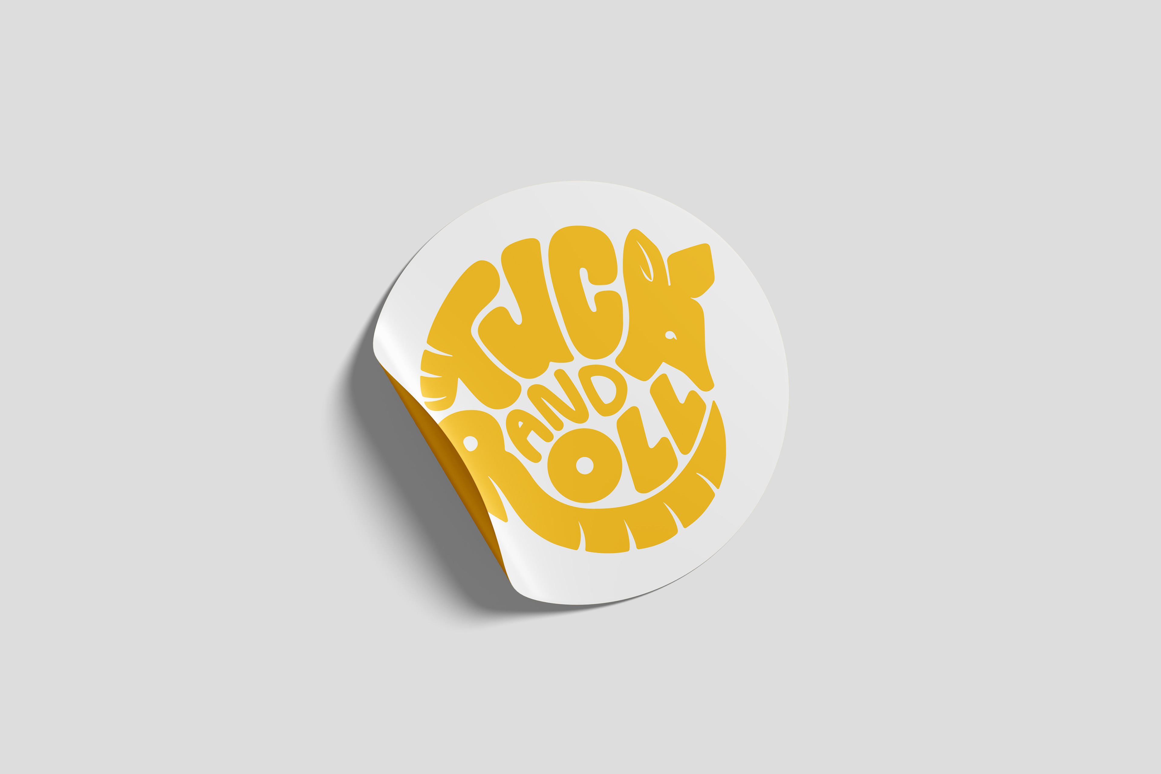 Tuck and Roll: The Art of Armadillos hand lettered logo on a sticker