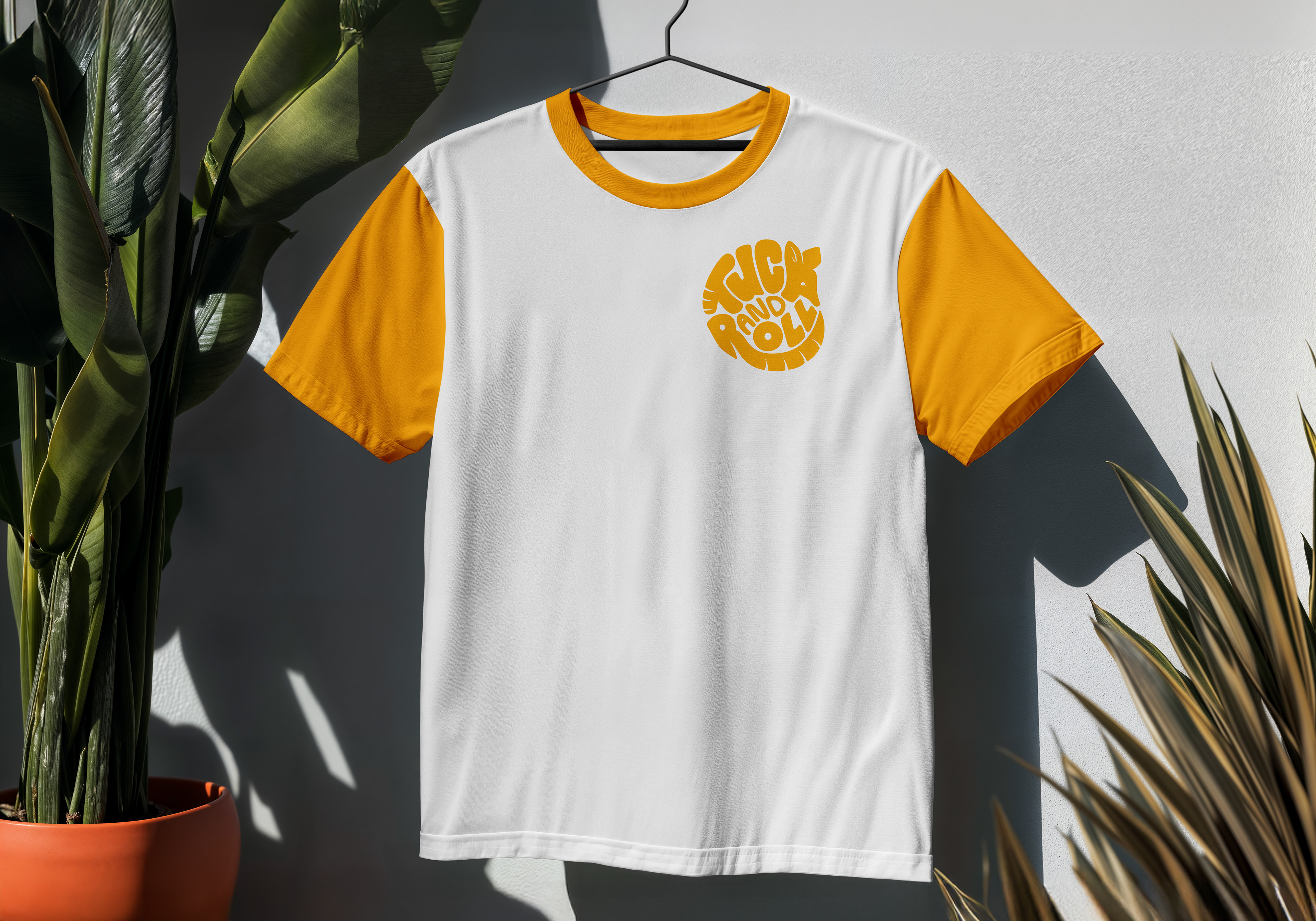 Tuck and Roll: The Art of Armadillos handlettered logo on a t-shirt