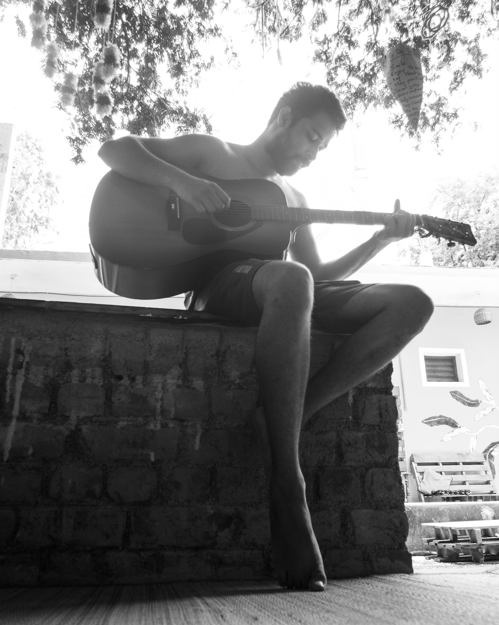Aditya playing his guitar