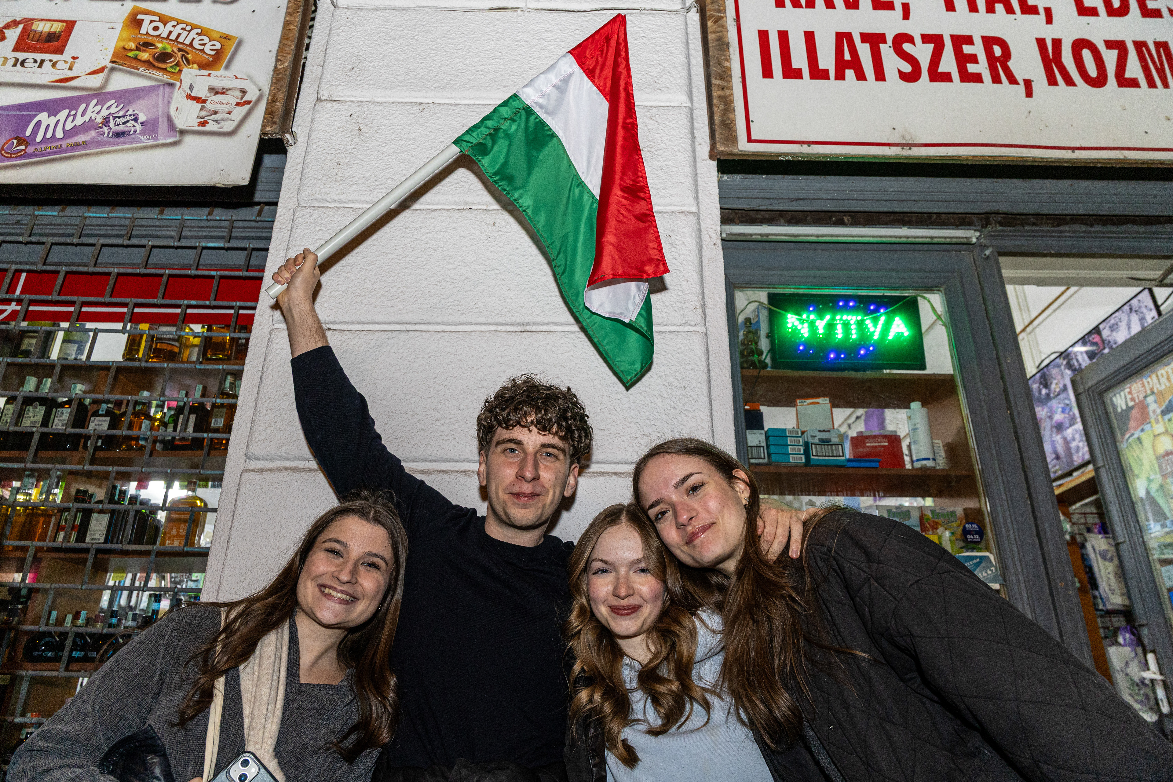Tisza party supporters celebrate election victory.