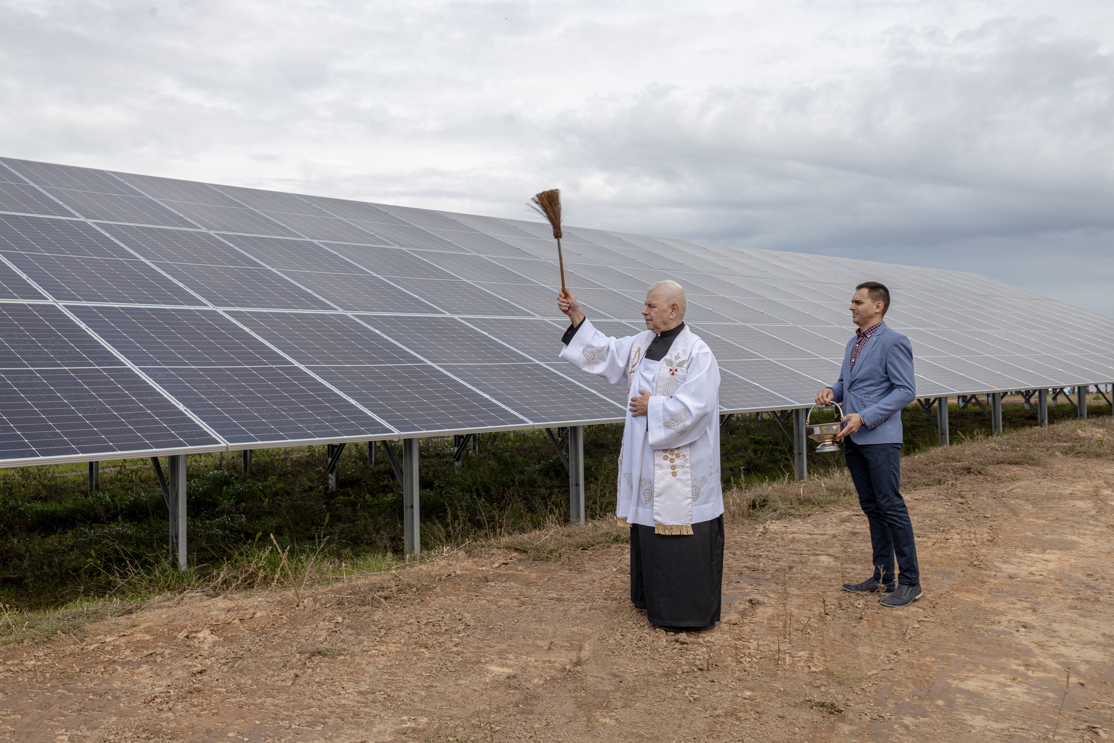 A priest blessing a solar farm in the village of Zwartowo, Kashubia, Poland.
