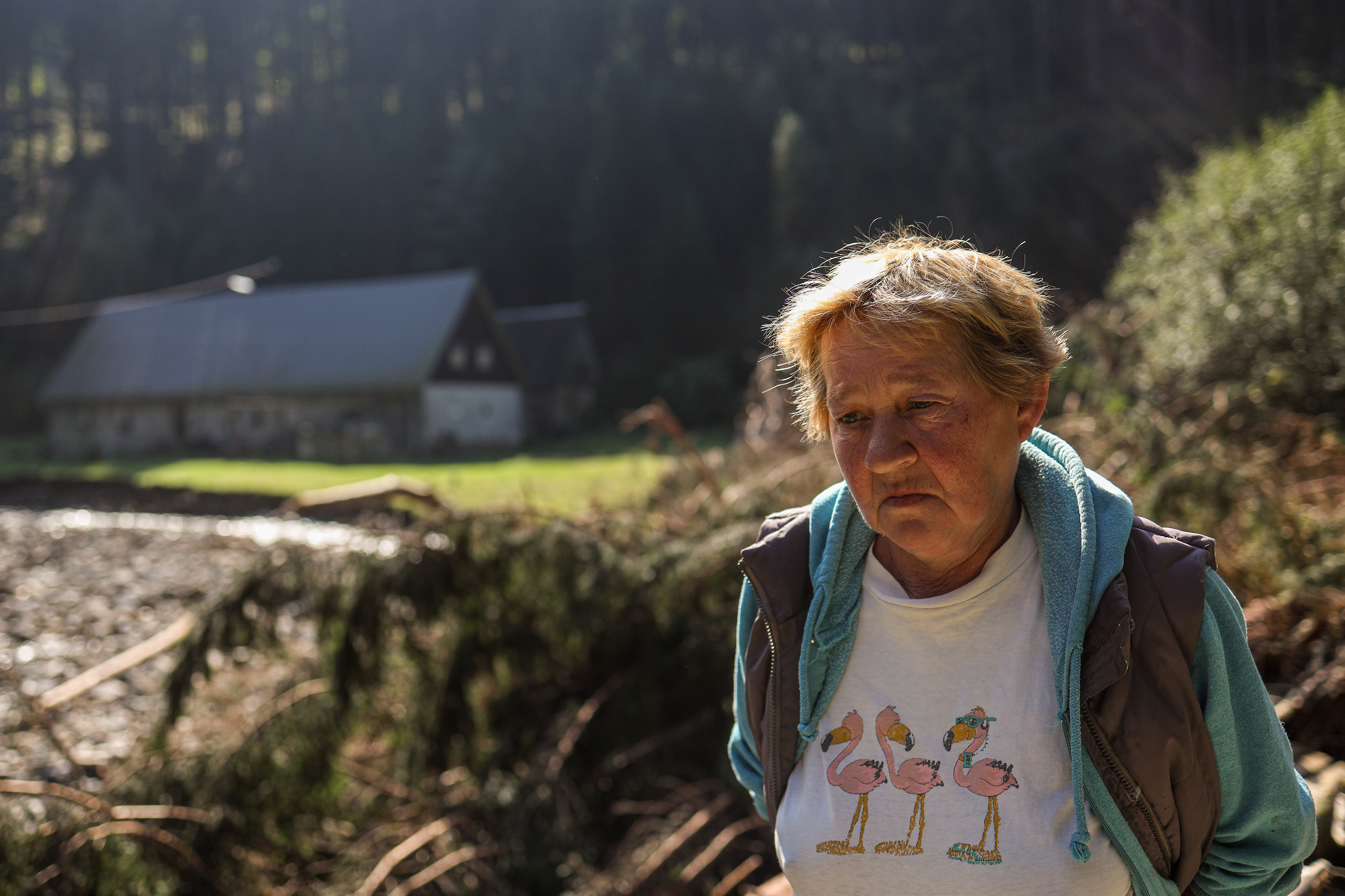 Nowy Gierałtów, Poland. Teresa stands outside her home in a village cut off from the outside world after floodwaters destroyed roads, bridges, and utilities.