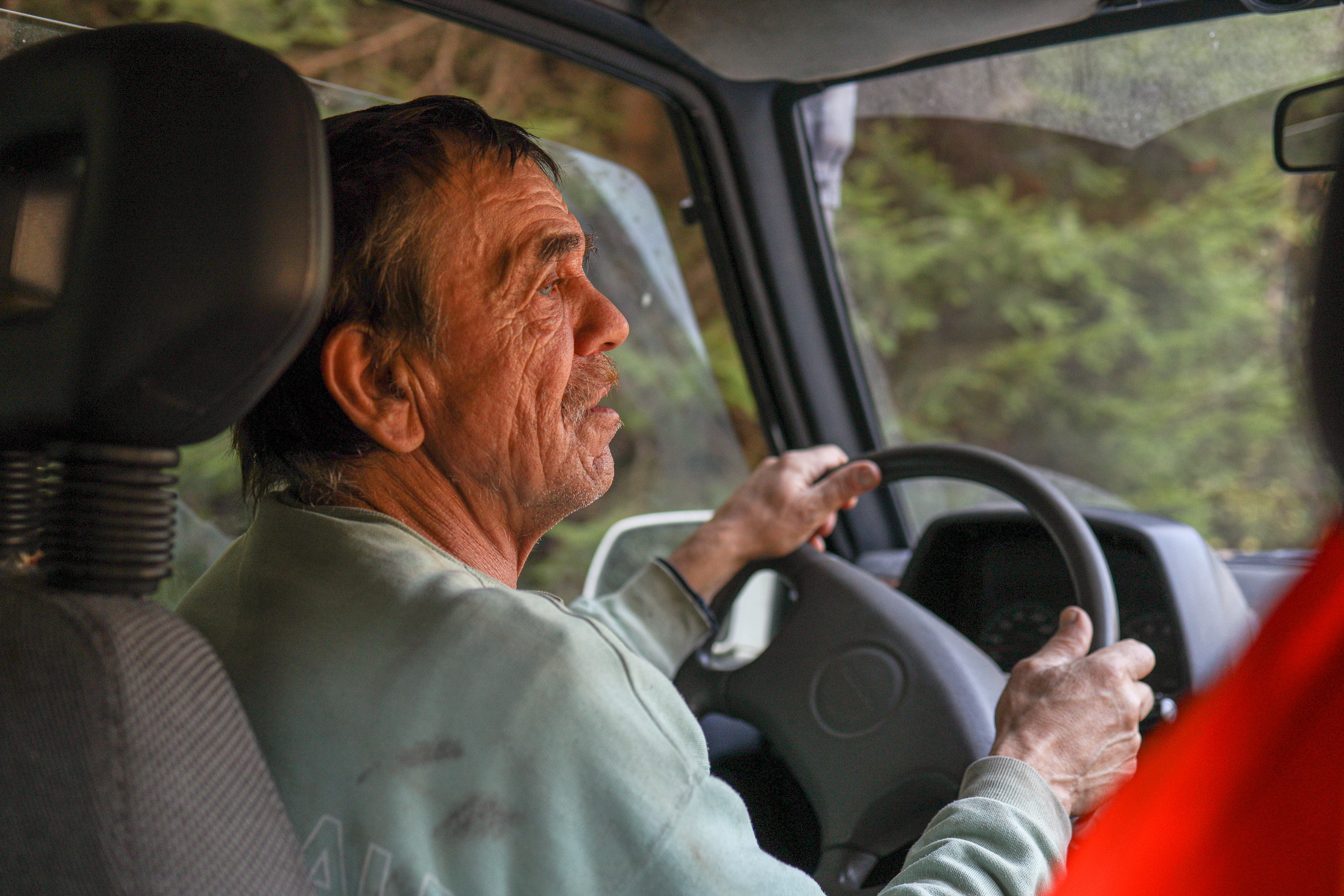 Bielice, Poland. Jan drives through the affected area, navigating damaged forest roads used as the only access route after the flood cut off the village.