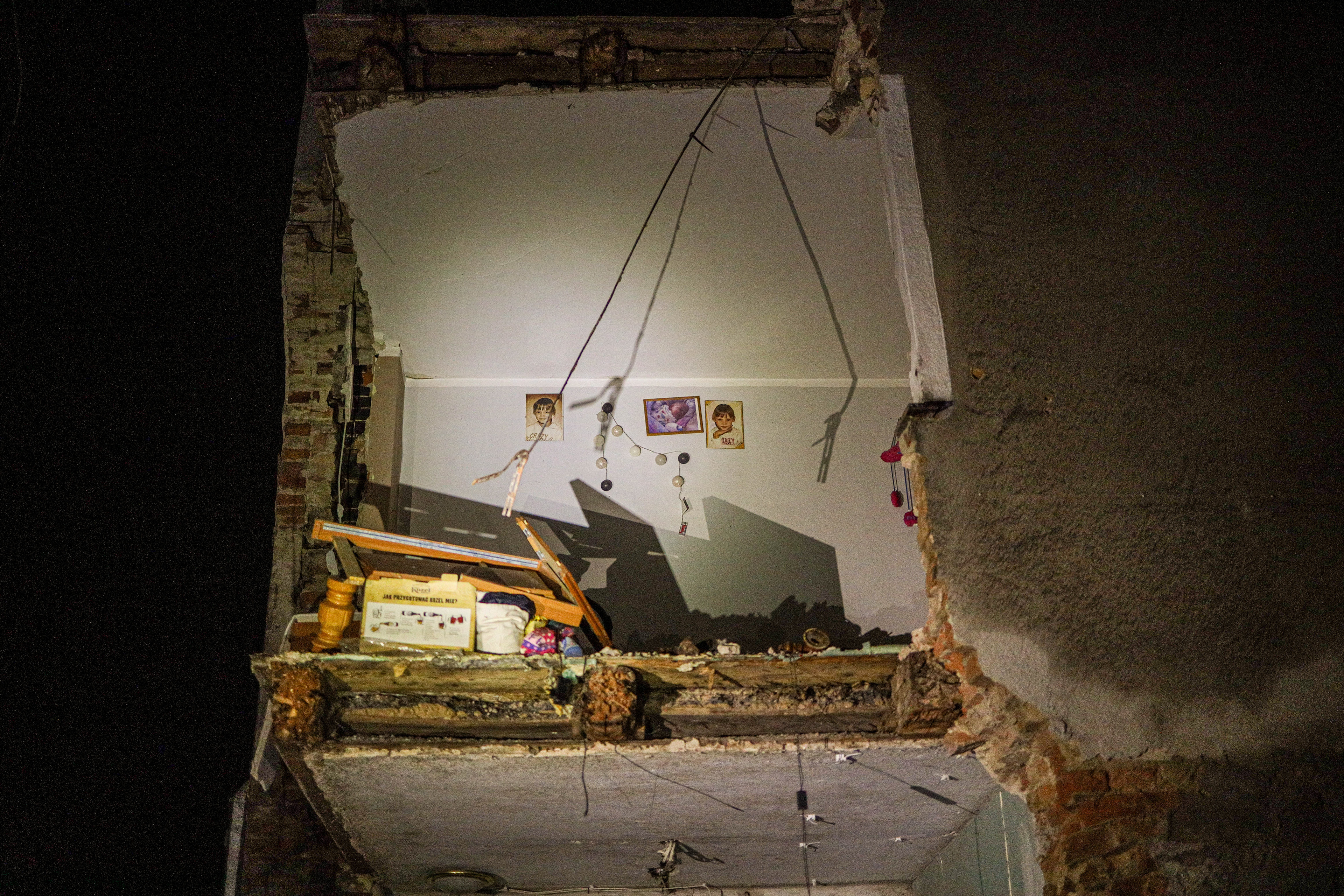 Stronie Śląskie, Poland. The interior of a home is exposed after floodwaters ripped away an exterior wall, leaving everyday life suddenly open to the outside.