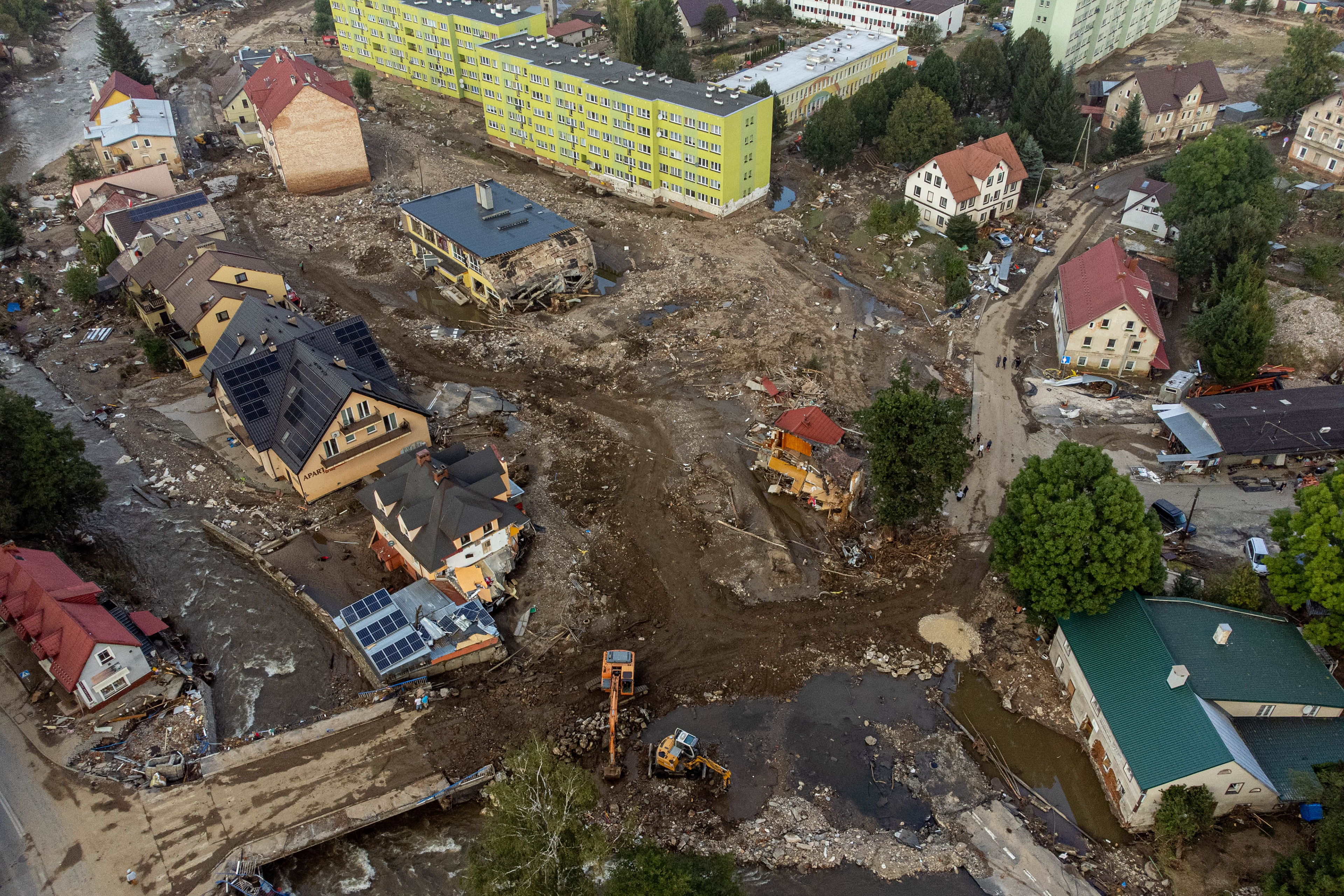 Stronie Śląskie, Poland. The town center was devastated after a nearby dam burst, sending a powerful wave through the valley. Entire streets were washed away, leaving behind debris, mud, and collapsed buildings.
