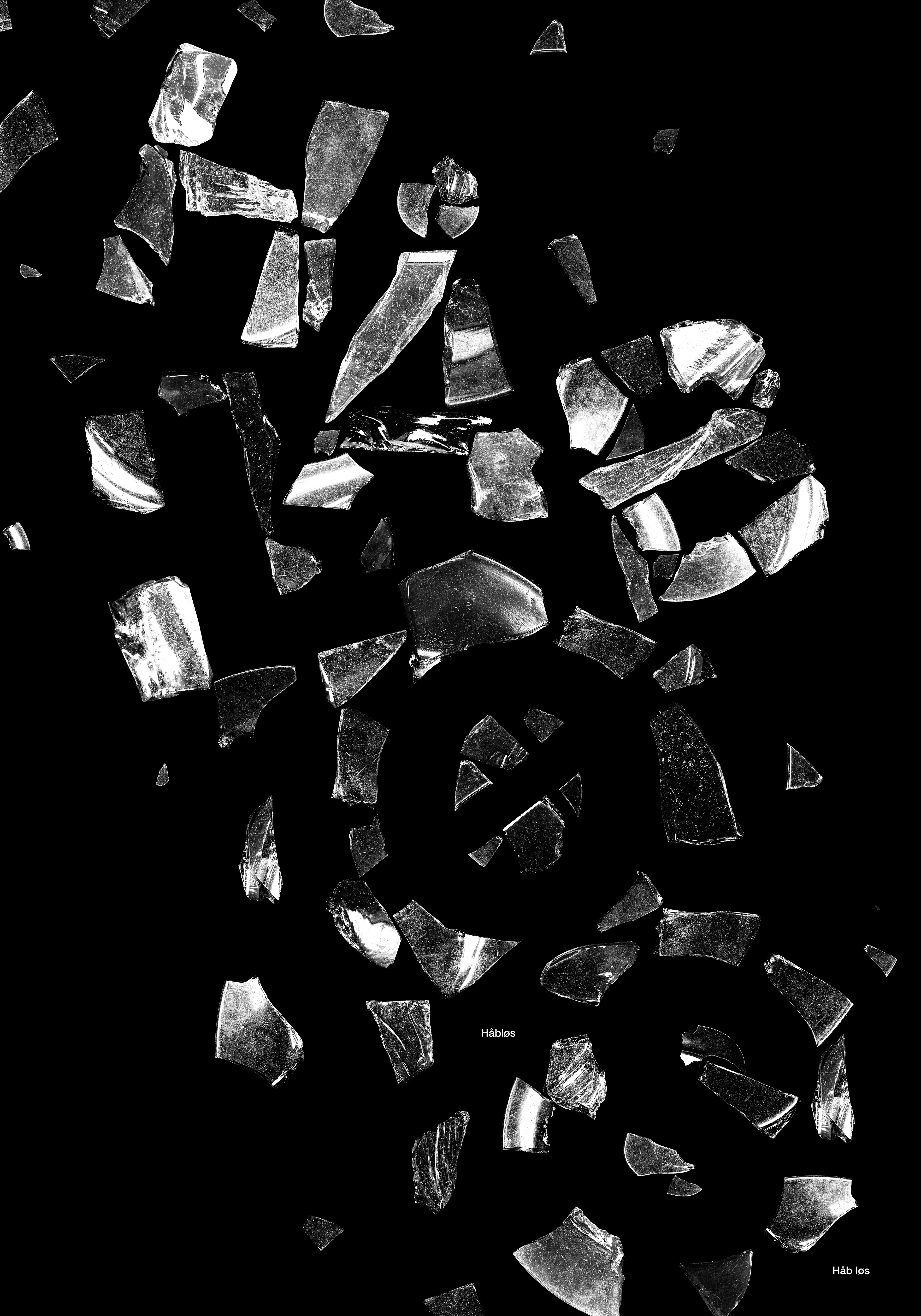 Typografisk plakat: Faldende glasskår danner to ord.