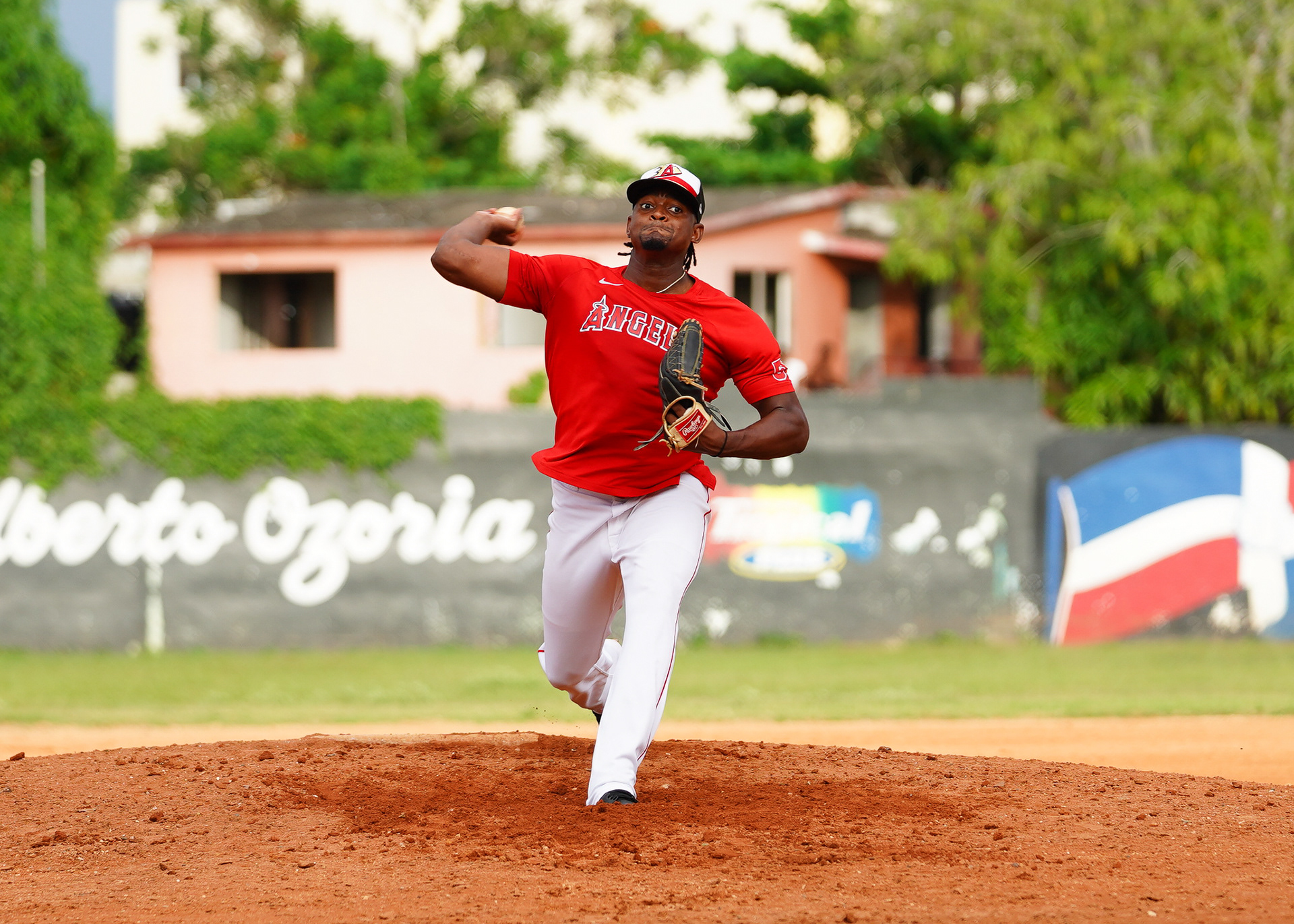 Angels pitcher José Soriano unleashes a fastball during warm-ups before the start of the inning.