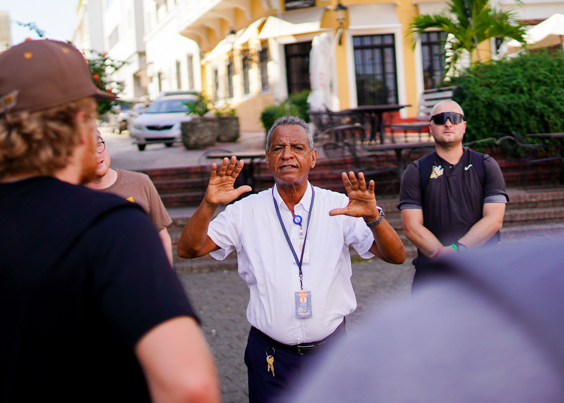 A tour guide leads Baldwin Wallace students through the Colonial Zone, sharing the history and culture of Santo Domingo.