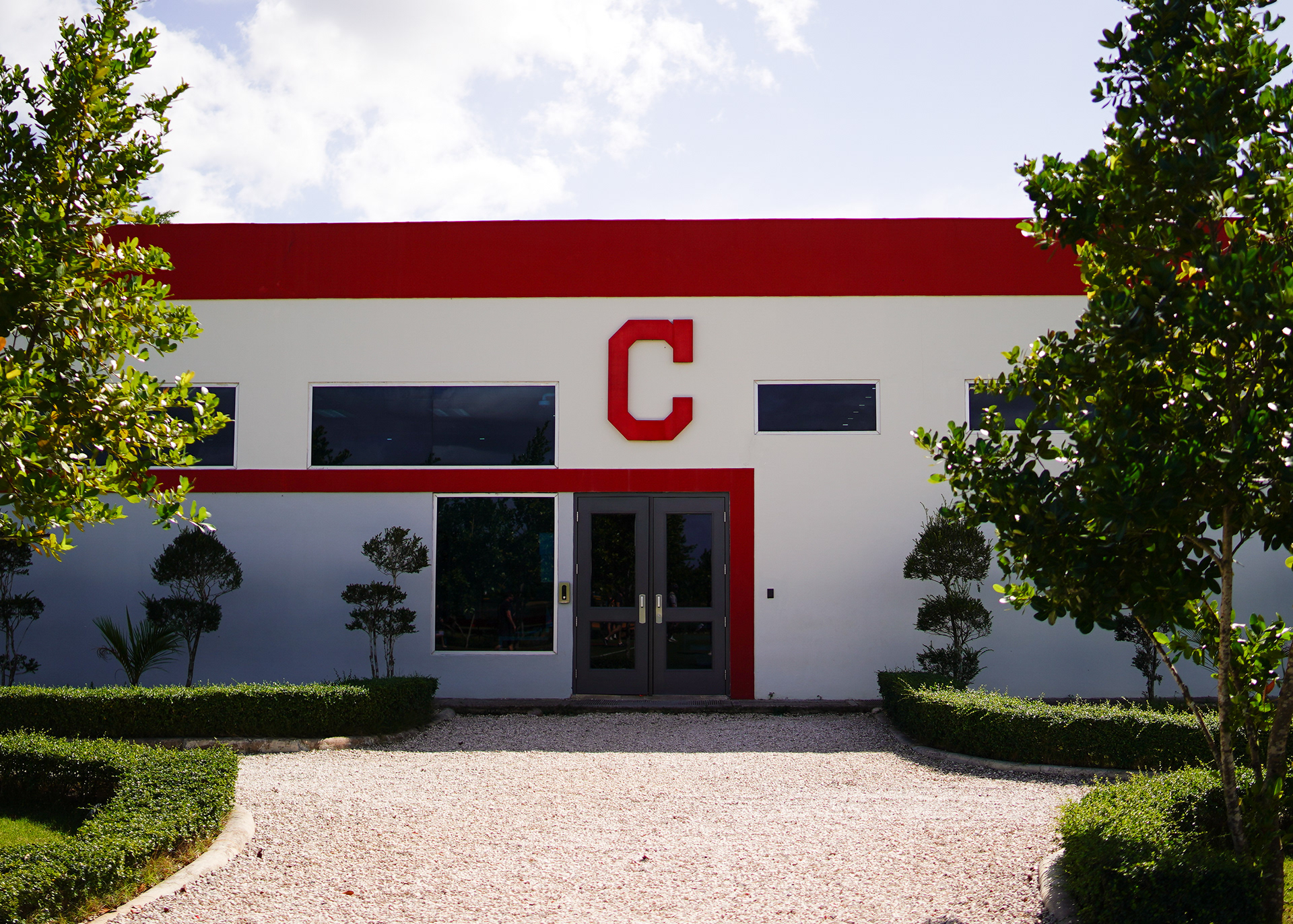The entrance to the Guardians' player development complex, home to the organization's hitting facility and batting cages.