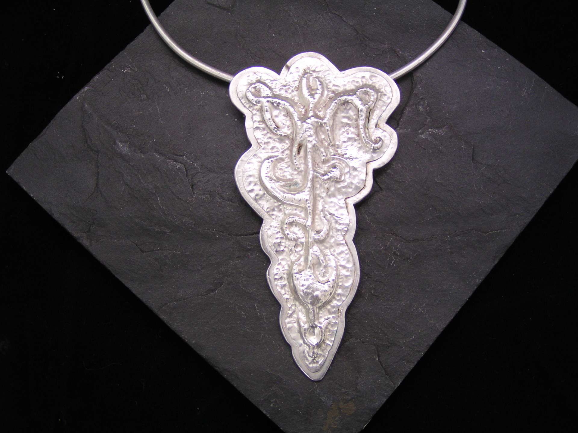 Repoussé and chasing over lasercut steel
