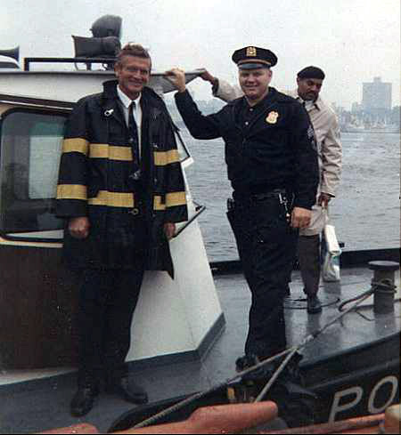 Sgt. Howard Smith with Mayor Lindsay at his assignment to Harbor