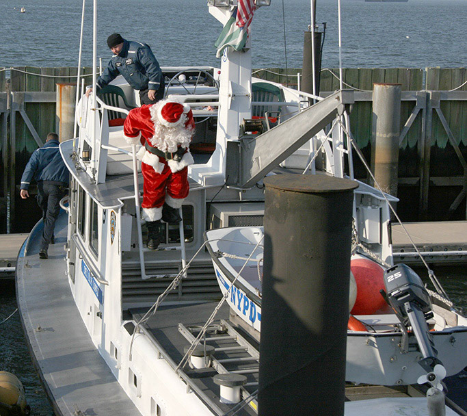 Santa climbs down from his sleigh