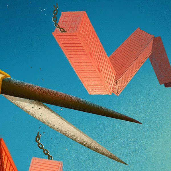 A closeup image of the scissor blades cutting through the chain.